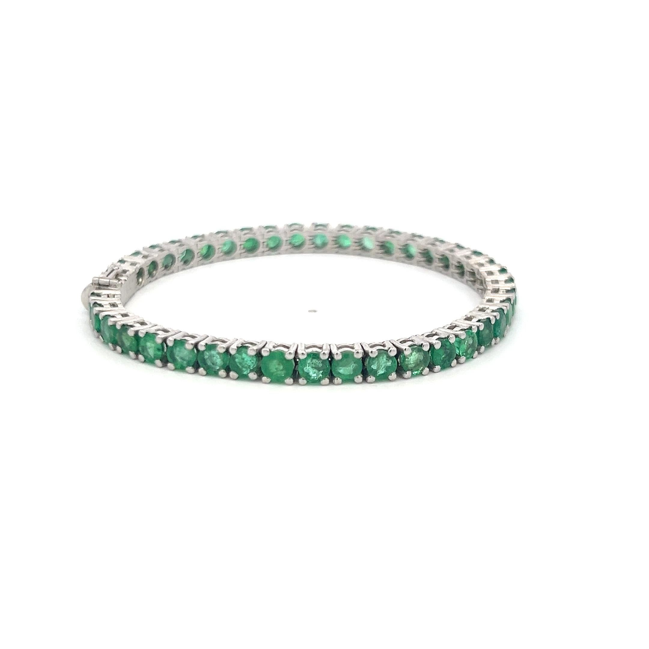 Title:
9.25 Carat Round Brilliant Emerald 18 Karat White Gold Tennis Bracelet
Style:
Tennis
Metal:
18 Karat White Gold
Gemstone 1:
9.25 Carat EMR
Number of Stones:
42
Shape:
Round Brilliant
Dimension:
7*0.17*0.12IN
Weight:
18.5