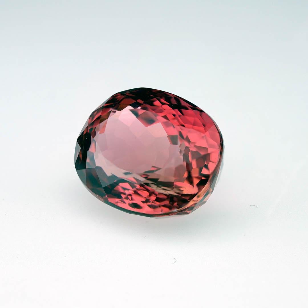 This exceptional and sizable 9.25 carat Rubellite Tourmaline boasts a rich, saturated magenta-red hue that captures and reflects light with intensity. Expertly faceted to showcase its internal fire, this gemstone is a true standout: combining depth