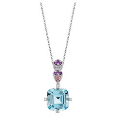 9.25 Carat Swiss Blue Topaz Pendant in 18KWG with Multi Gemstone and Diamond.