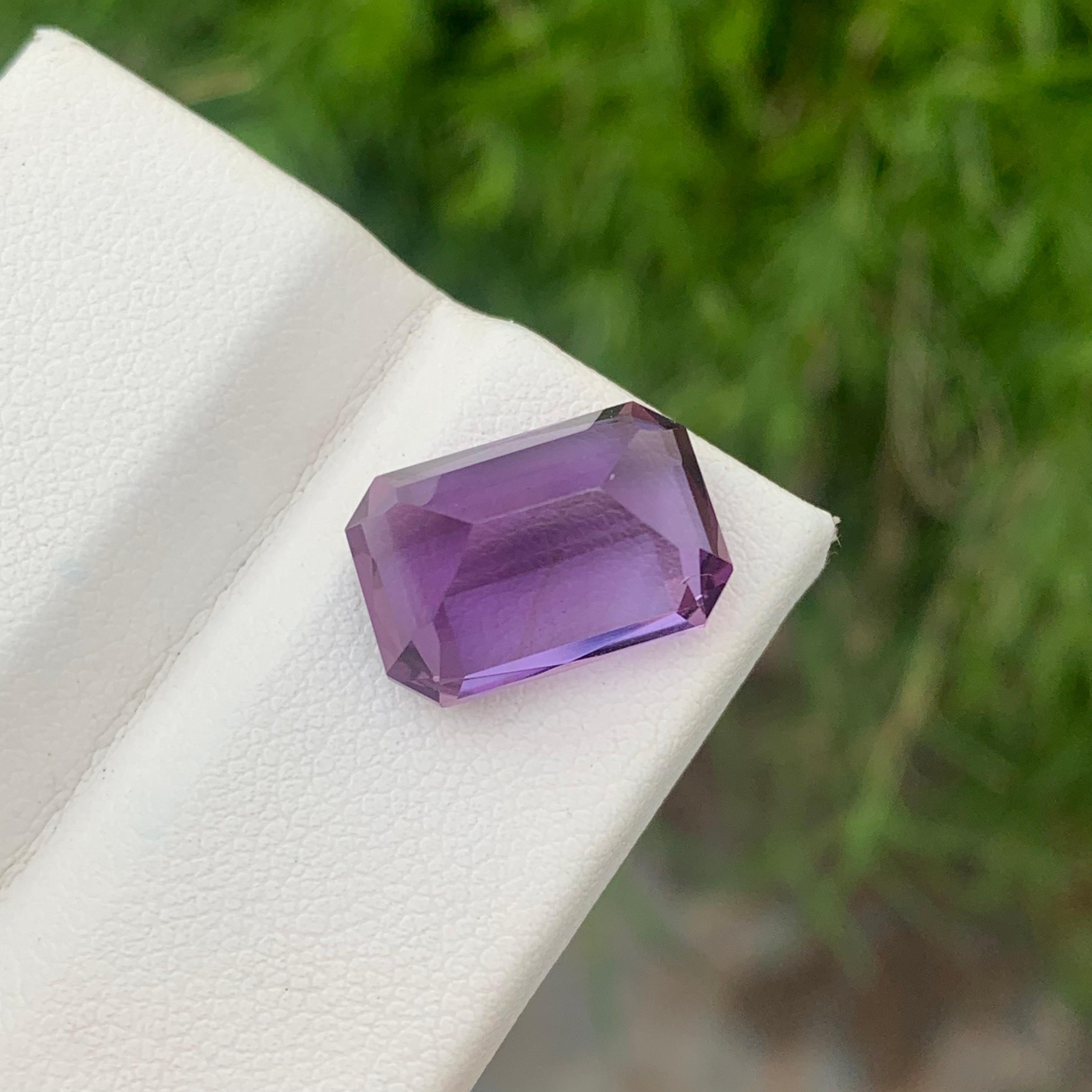 Loose Amethyst 
Weight: 9.25 Carats 
Dimension: 14.7x10x8.8 Mm
Origin: Brazil
Color: Purple
Shape: Emerald 
Certificate: On Customer Demand 
Amethyst is a captivating purple gemstone that has been cherished for centuries. Its name derives from the