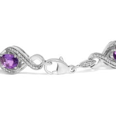 .925 Silver 1/10 Cttw Natural Diamond and Oval Amethyst Cross Tennis Bracelet