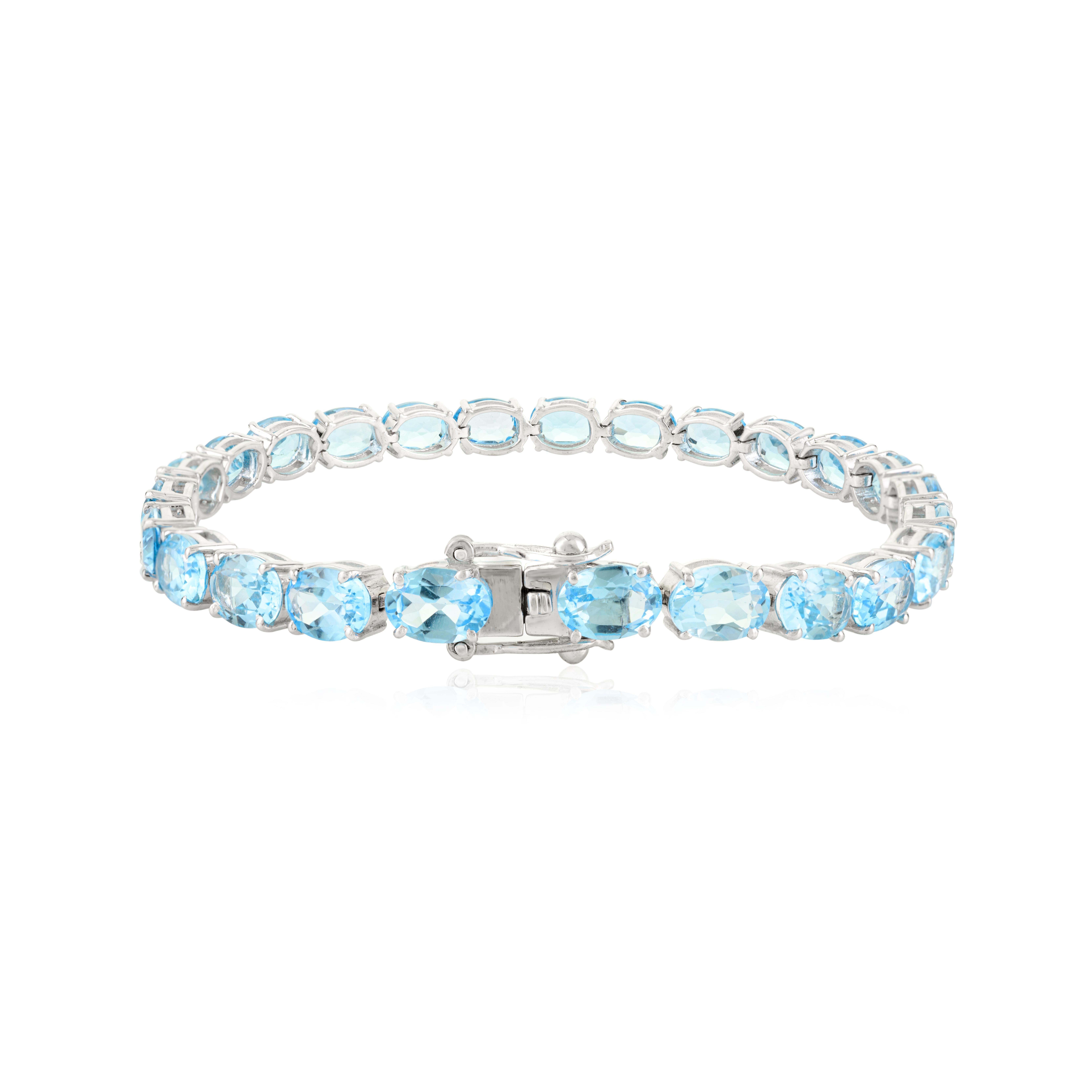 Bracciale tennis in argento 925 da 22,63 carati con gemme di topazio blu sfaccettate per la nonna In condizioni Nuovo in vendita a New York, NY