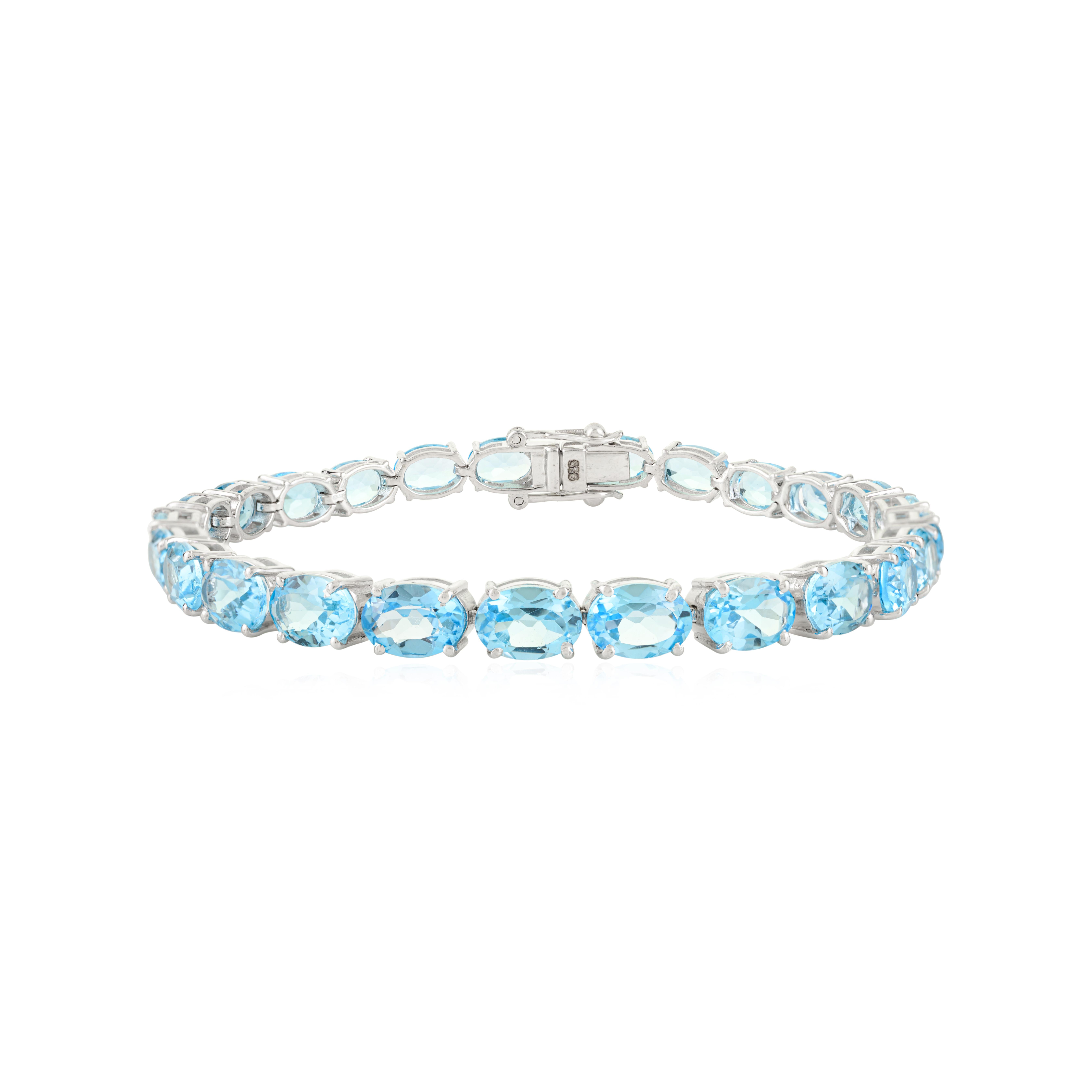 Bracciale tennis in argento 925 da 22,63 carati con gemme di topazio blu sfaccettate per la nonna in vendita 1