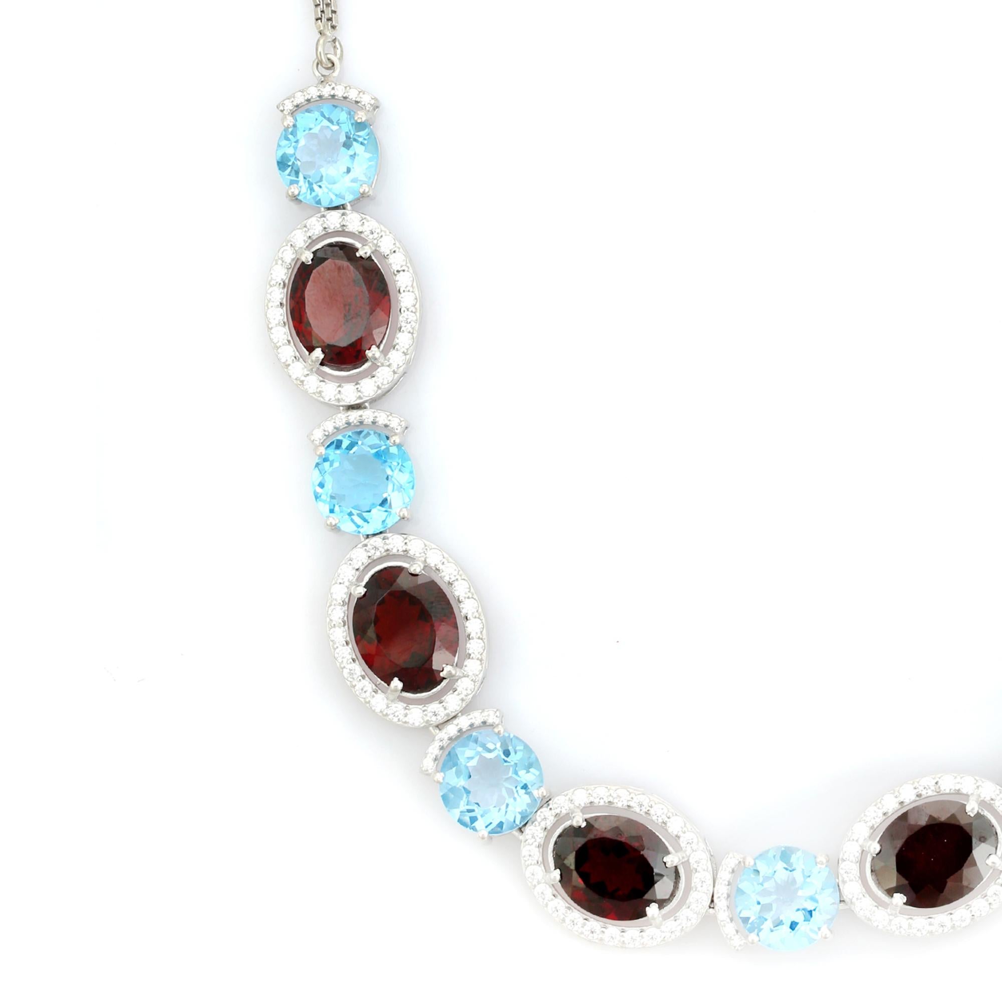 De las mujeres Collar de plata 925 con granate y topacio azul en dos tonos y halo de circonitas cúbicas en venta