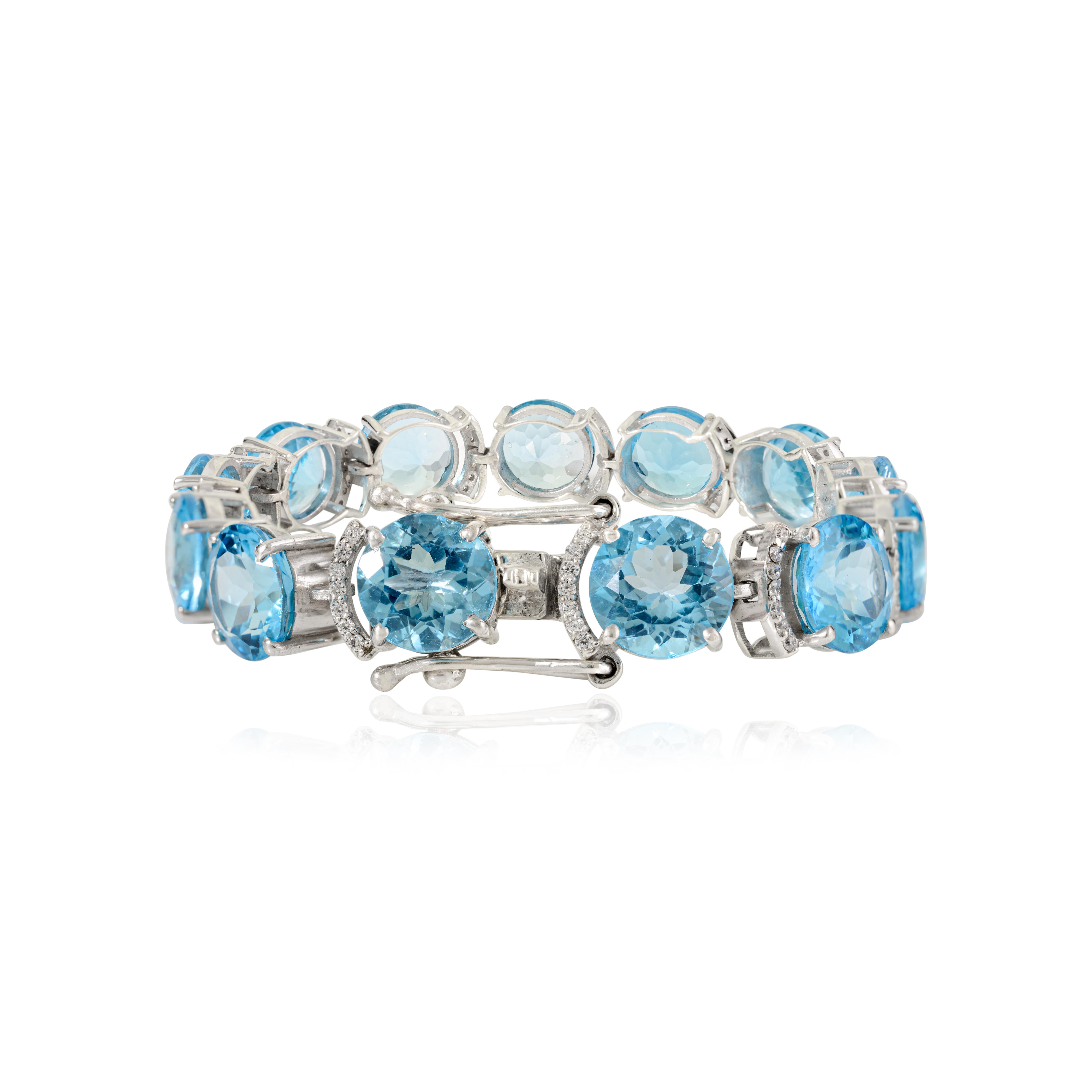 Bracelet de tennis en argent 925 avec topaze bleue naturelle et zircon Neuf - En vente à New York, NY