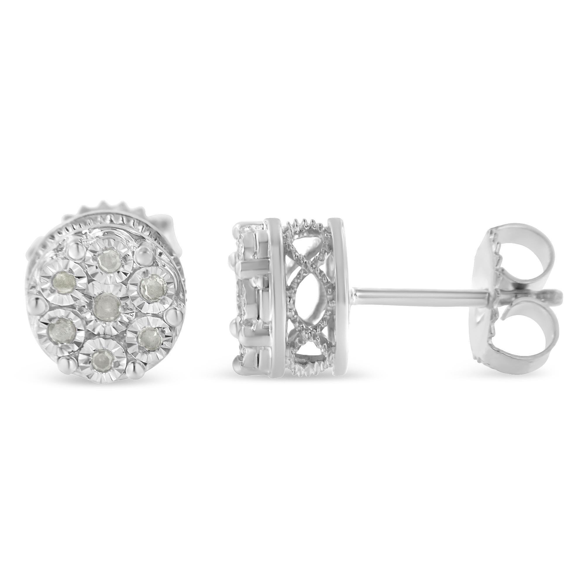 Time to make your appearance glow with this shimmering pair of stud earrings. The pair made with sterling silver also features 14 fragments of round-cut diamonds arranged in a miracle setting. These earrings can make it easy for one to charm with