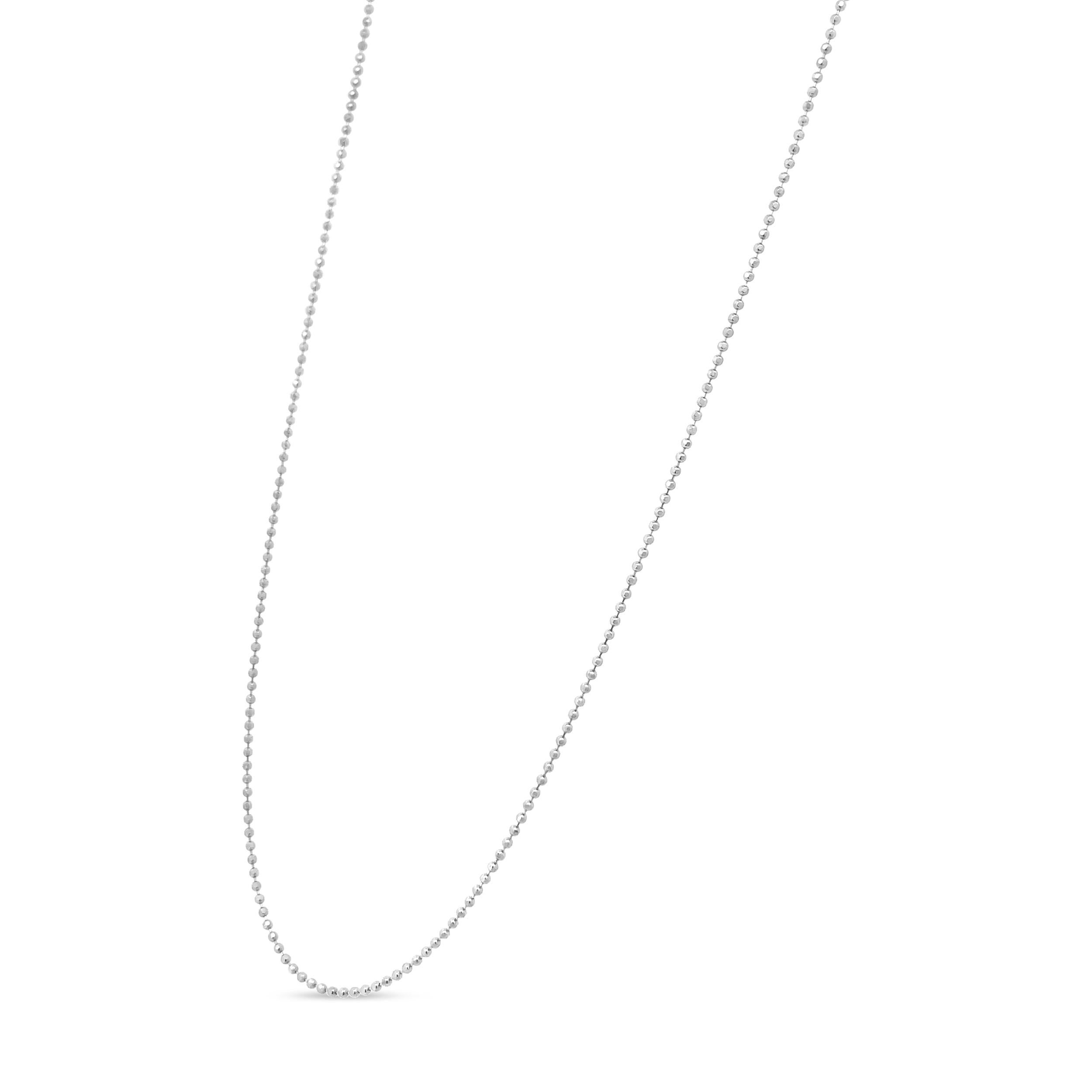Presenting a feminine classic: a simple and dainty .925 sterling silver Ball bead chain. This thin, .70 millimeter wide chain fastens securely with a standard spring ring clasp. It can replace most chains and is perfect paired with small to medium