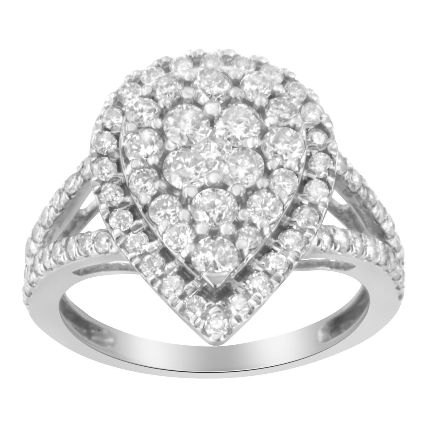 A bold silver and diamond cluster ring. This pear-shaped ring is made with 80 round-cut, natural diamonds in a prong setting, weighing a total of 1 1/2 ct. The diamonds are set in stunning sterling silver.

Product Features: 

Diamond Type: Natural