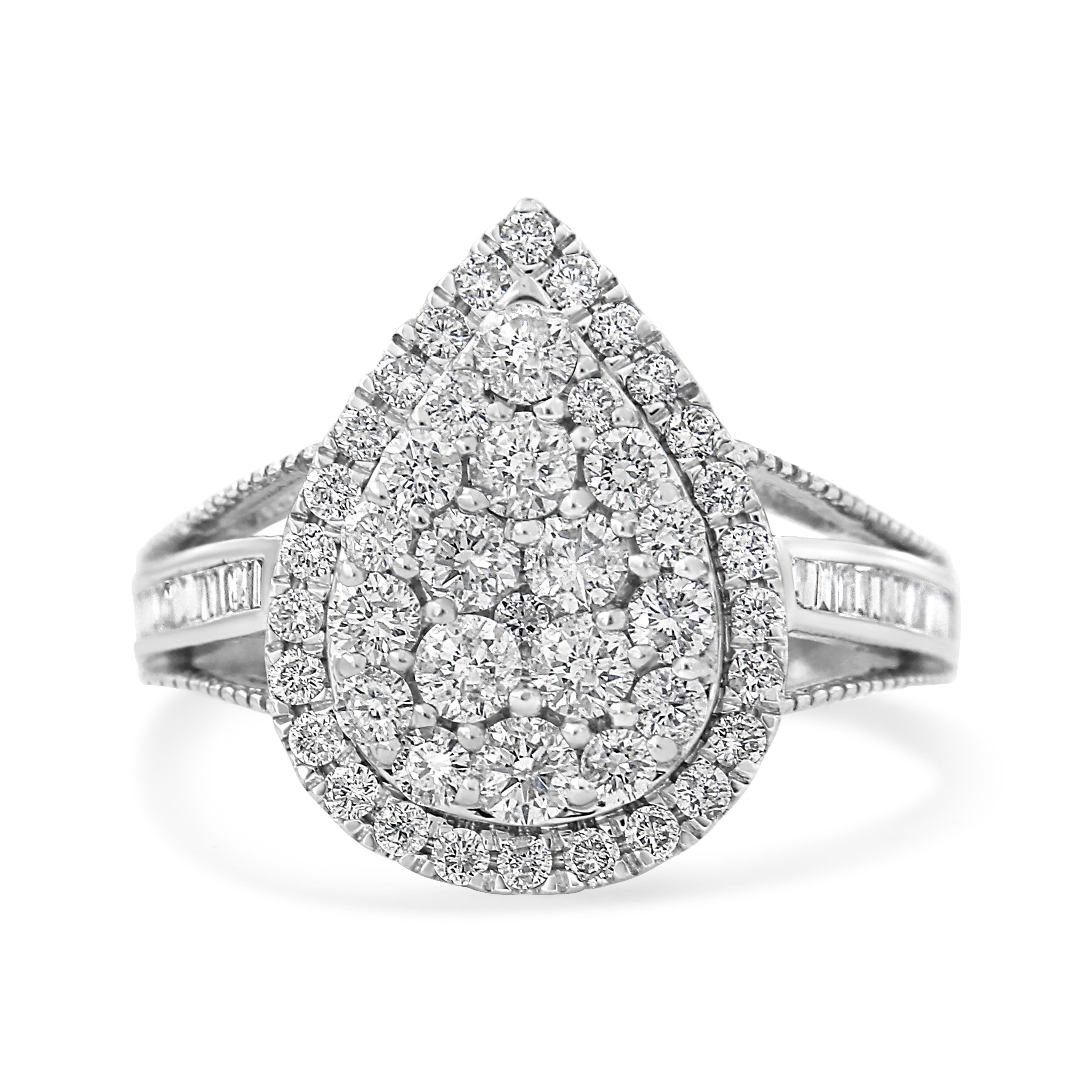 Dazzle and delight her with this stunning diamond cocktail ring. Crafted in cool .925 sterling, this fancy-shape fashion ring showcases a sparkling a stunning total weight of 1 1/2 carat of diamonds wrapped in a pear-shaped frame of round diamonds.