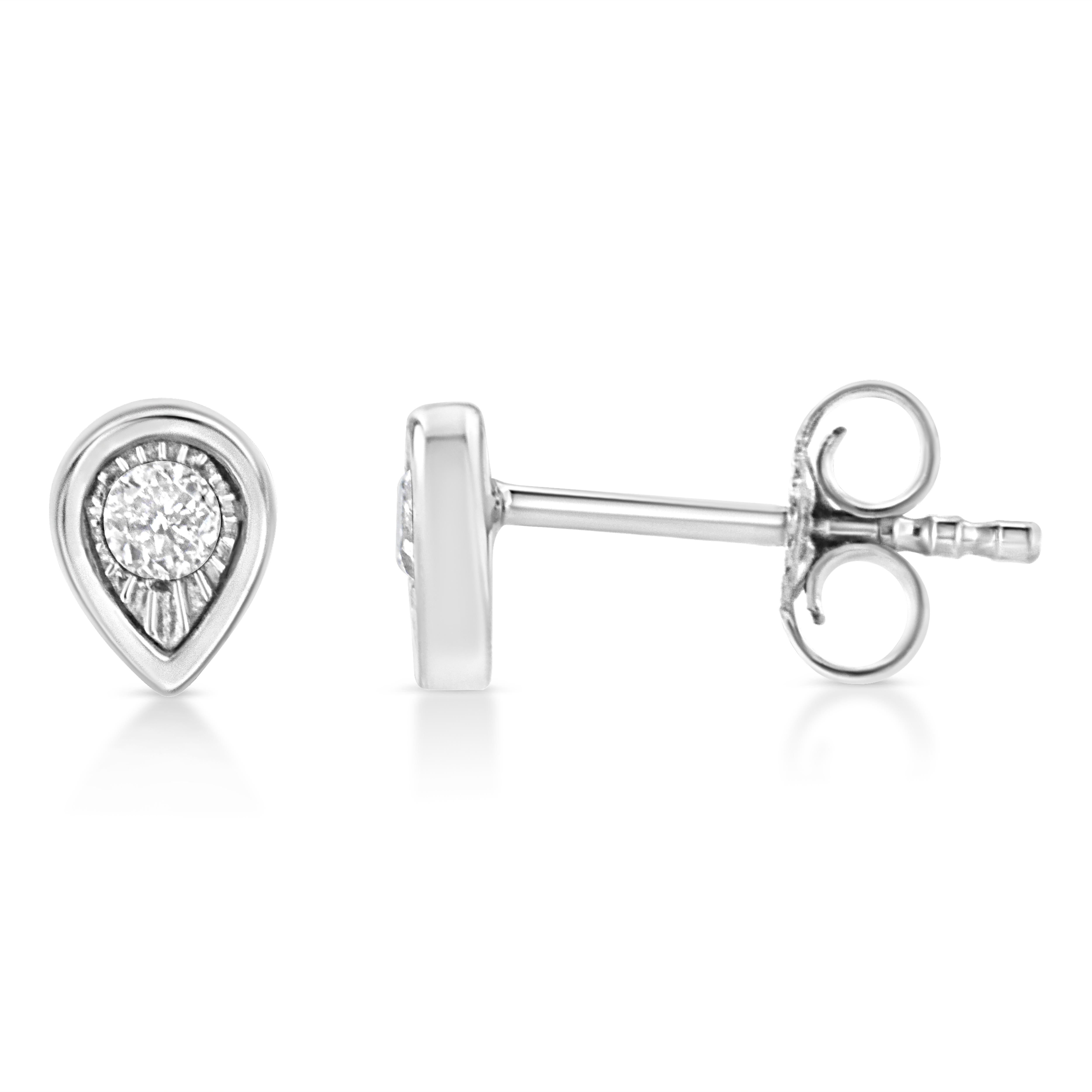 These pear shaped stud earrings are crafted in .925 sterling silver and feature 1/10ct TDW of diamonds. Each earring features a single sparkling round cut diamond in a miracle setting that adds to the earrings' sparkle. A polished silver halo
