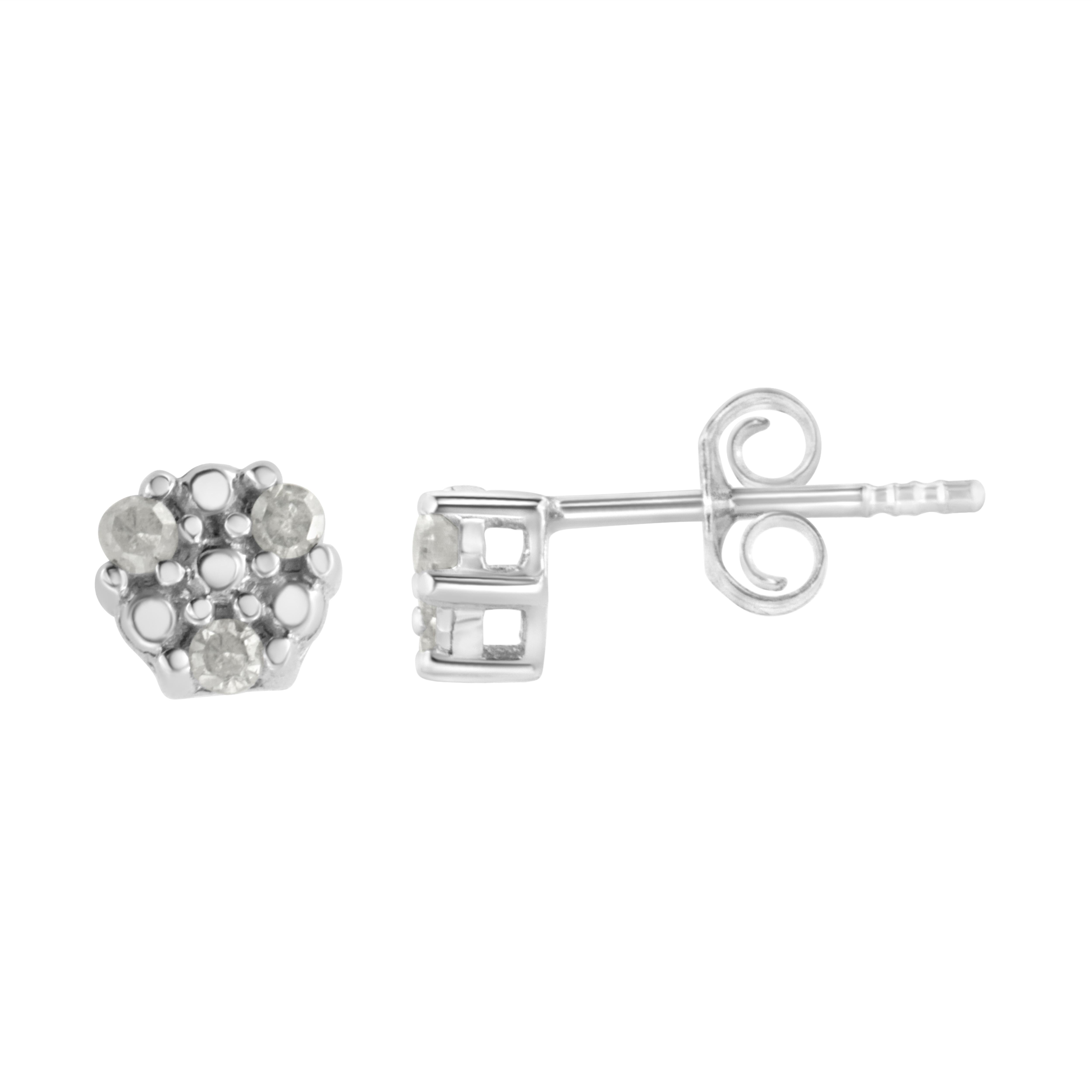 Unleash your inner radiance with these exquisite .925 sterling silver trio diamond stud earrings. Expertly crafted, these captivating earrings feature six natural round-cut diamonds, each boasting a total weight of 1/10 carat. The diamonds, with
