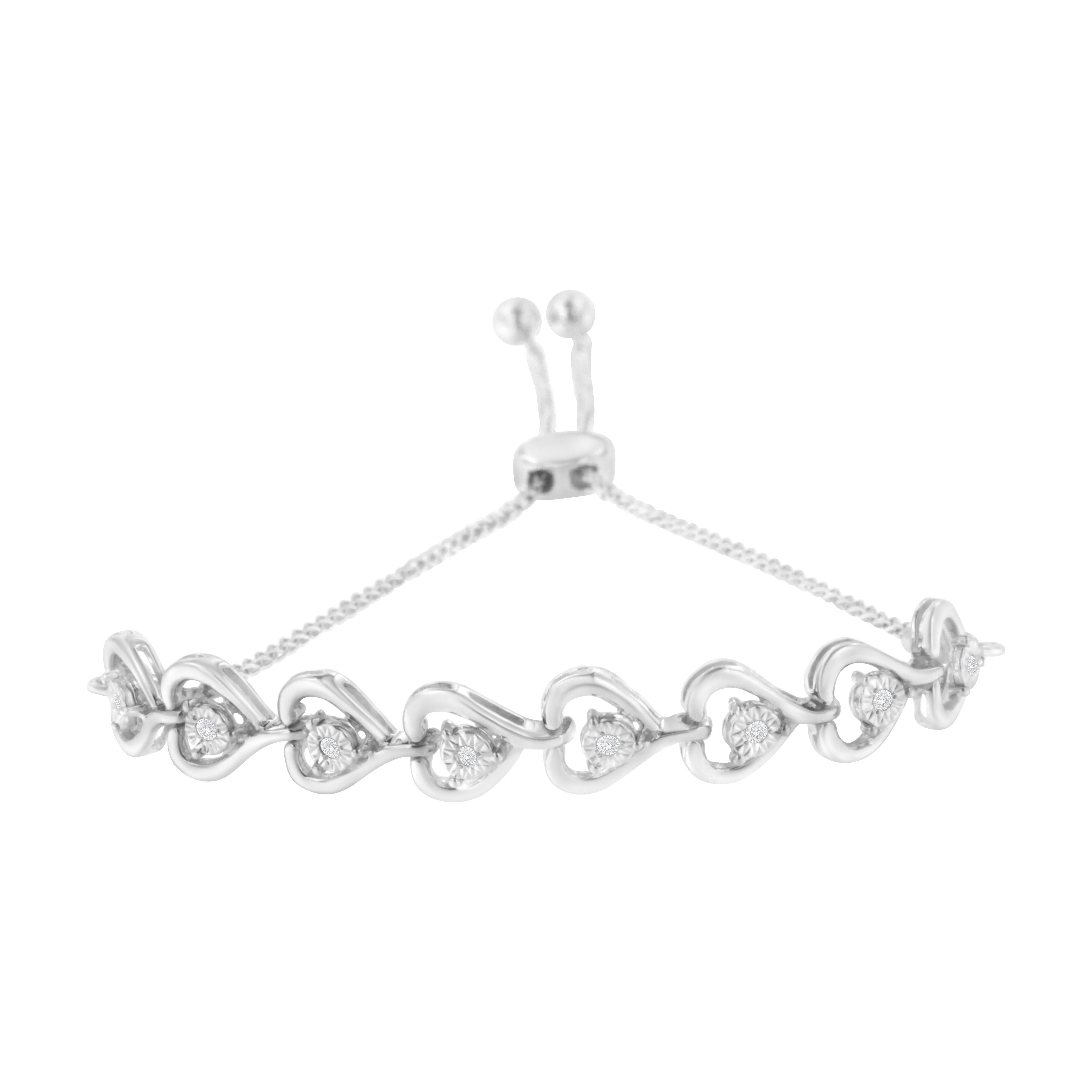 Elevate your wrist with our exquisite woven heart bolo bracelet, a testament to love and luxury. Crafted from .925 sterling silver, it embraces elegance and durability. Adorned with 8 natural round-cut diamonds totaling 1/10 carat, each sparkles