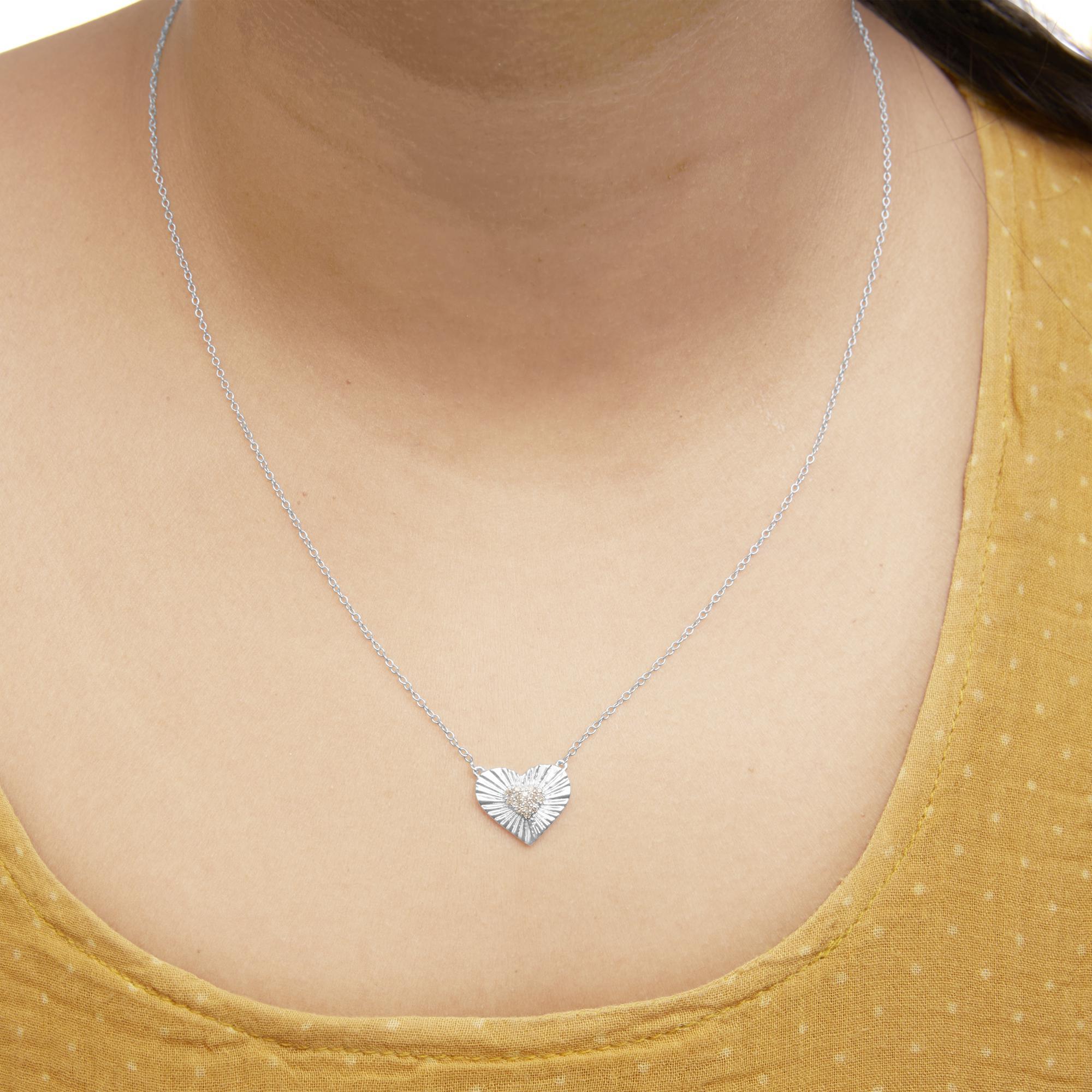 Round Cut .925 Sterling Silver 1/10 Cttw Diamond Cluster Heart 18
