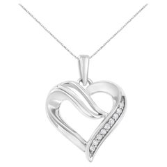 Collana con ciondolo a cuore aperto in argento 925 con diamanti da 1/10 Cttw