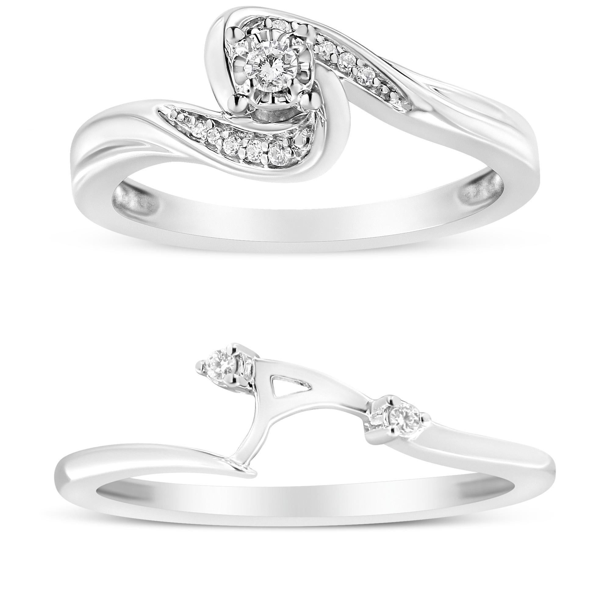 Indulge in the mesmerizing allure of this .925 Sterling Silver Bridal Set Ring and Band. Crafted with utmost precision, this Elegant Collection piece showcases a captivating swirl and bypass design, symbolizing eternal love and commitment. Adorned