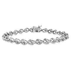.925 A. Silver 1/10 Cttw Round-Cut Diamond Links of Flame Bracciale