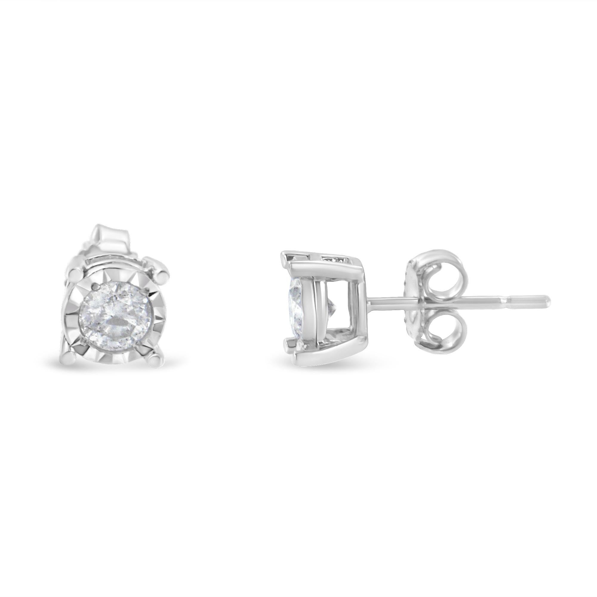 Precious and delicate, these .925 sterling silver stud earrings hold 1/2 a carat TDW of twinkling diamonds. The diamonds are secured in a miracle setting which makes them look larger and adds sparkle. A great piece for everyday wear that secures