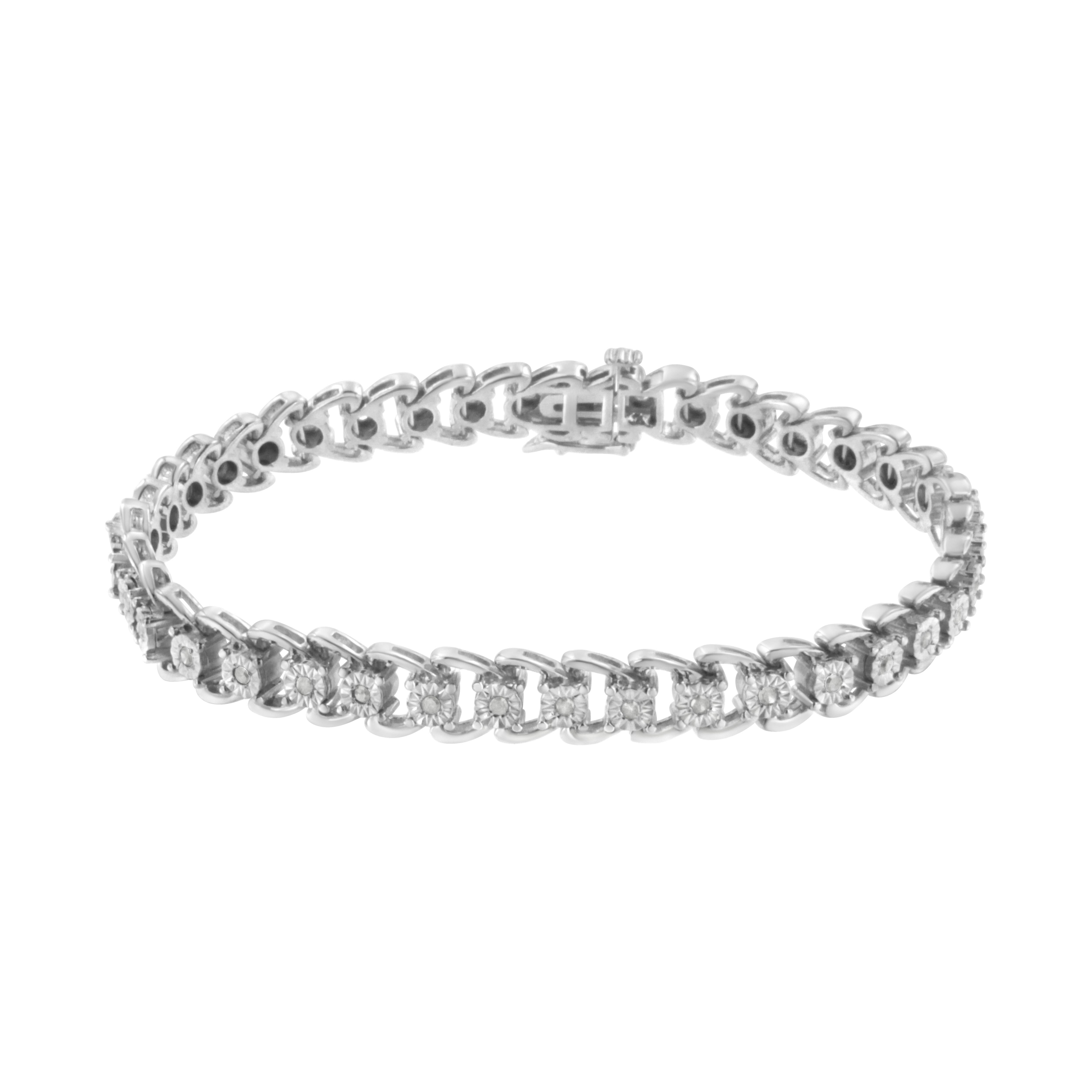 What makes this genuine .925 sterling silver bracelet so unique is the way each intricately detailed link flows into the next one for a dramatic wave effect. And the 38 eye-catching diamonds held inside add even more charm and character. 
A