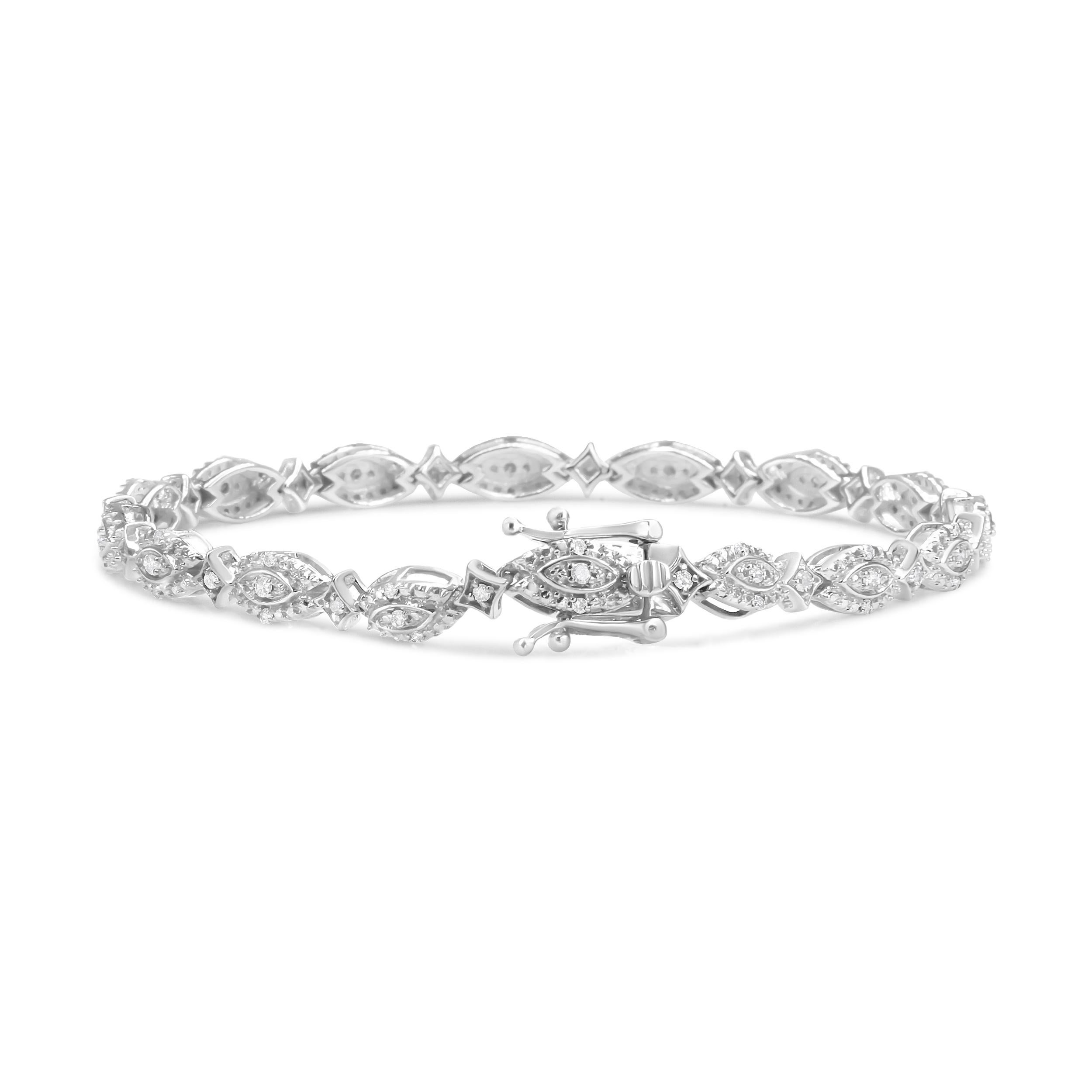 This show-stopping diamond link bracelet  is an enviable accessory detailed with the glamour of round diamonds cradled in prong settings, totaling 1/2 cttw with an approximate I-J Color and I2-I3 Clarity. Alternating marquis and starburst shaped