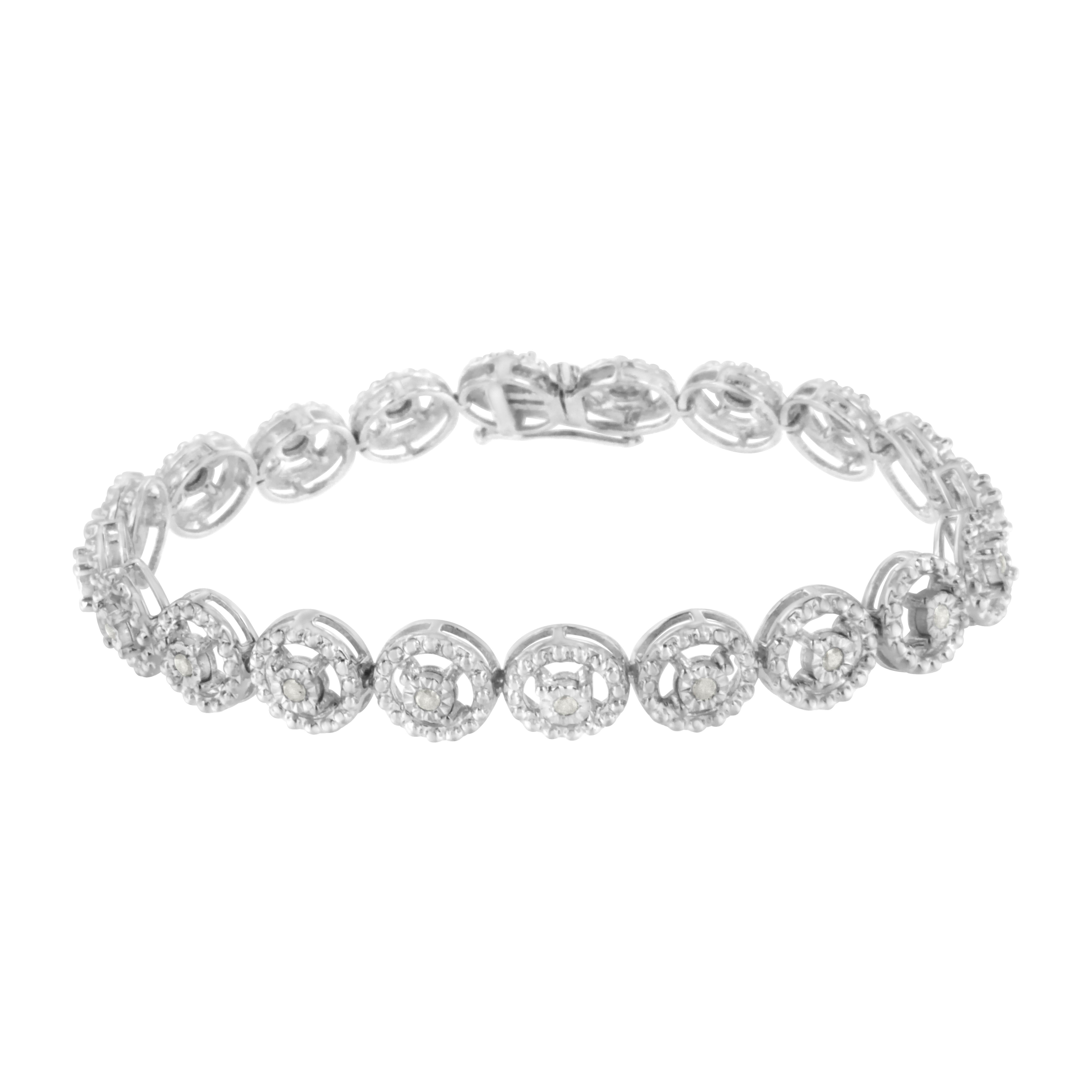 Your journey of love never ends. This sterling silver bracelet is a symbol of that sentiment, with interlocking circles of diamonds that wrap around in an endless loop. A timeless bracelet to show your never-ending love. Each genuine stone is