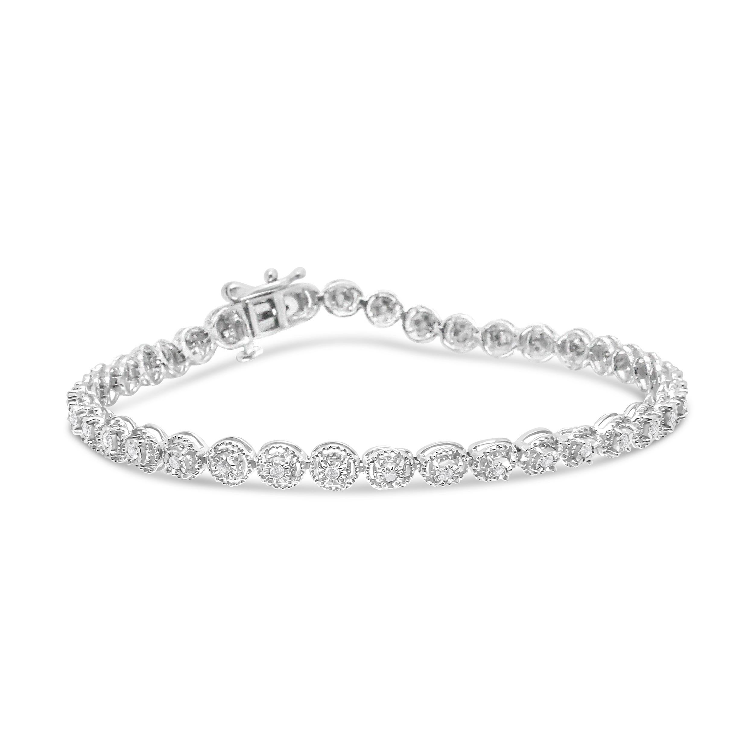 A circle represents eternal love. This sterling silver bracelet embraces that sentiment, with interlocking rings that hold round cut diamonds at the center. Wrapped around in an endless loop and embellished with fine milgrain design work, it's a