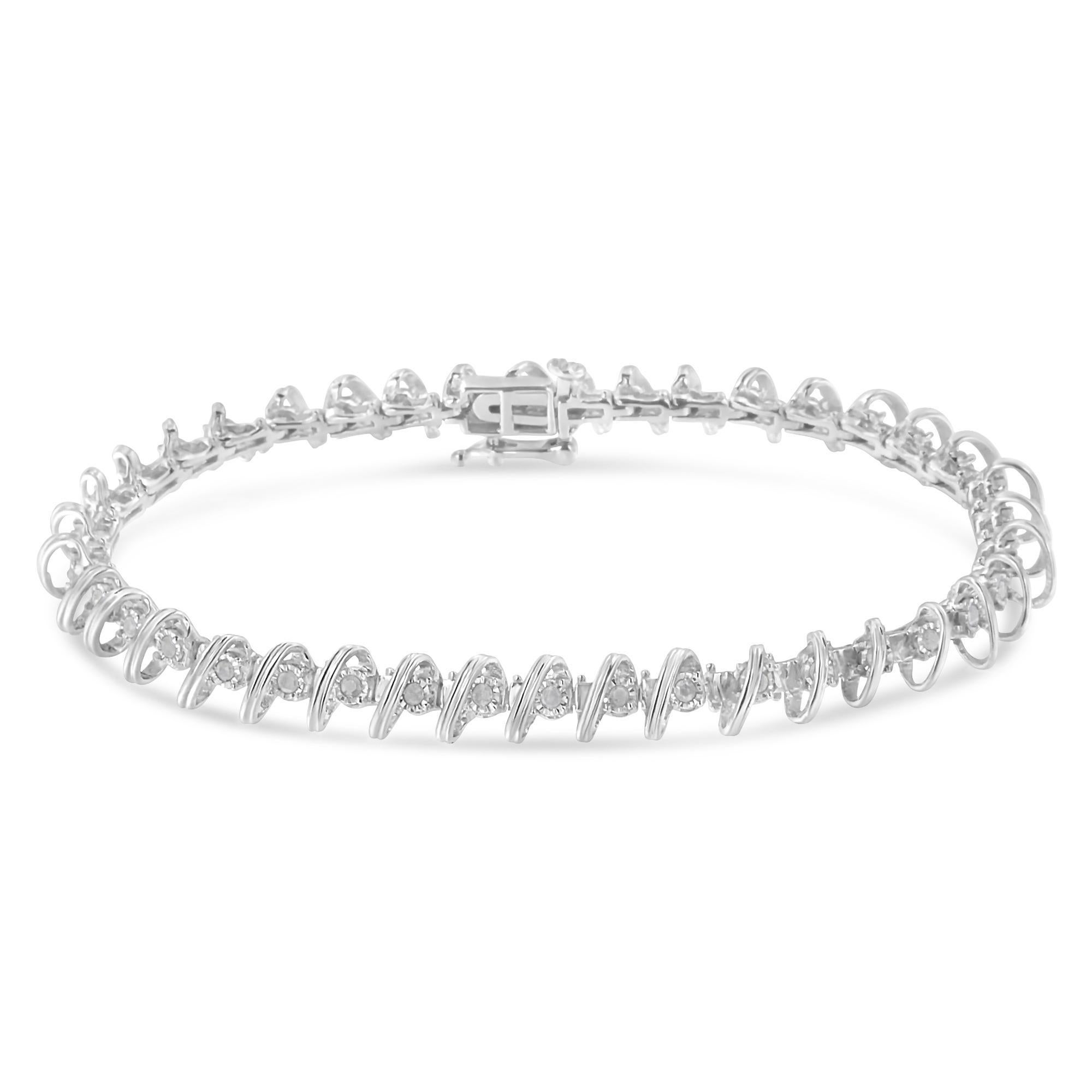 Elegant and timeless, this gorgeous sterling silver link bracelet features 0.5 carat total weight of round, rose cut, promo quality diamonds with 39 stones in all. The tennis bracelet features illusion set diamonds in our unique miracle-plate