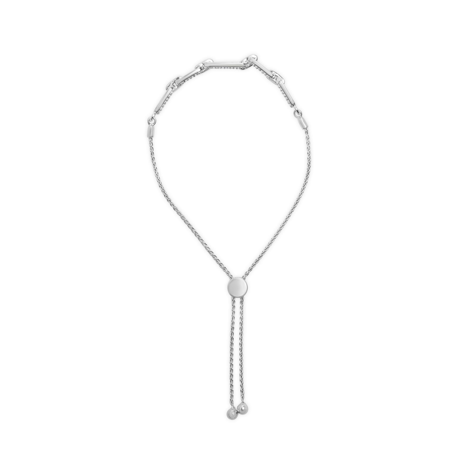 Scopri la quintessenza dell'eleganza con questo bracciale radioso, meticolosamente realizzato in argento 925 rodiato con finitura a specchio. Questo pezzo si distingue per il design moderno delle maglie a graffetta, ogni maglia è impreziosita da