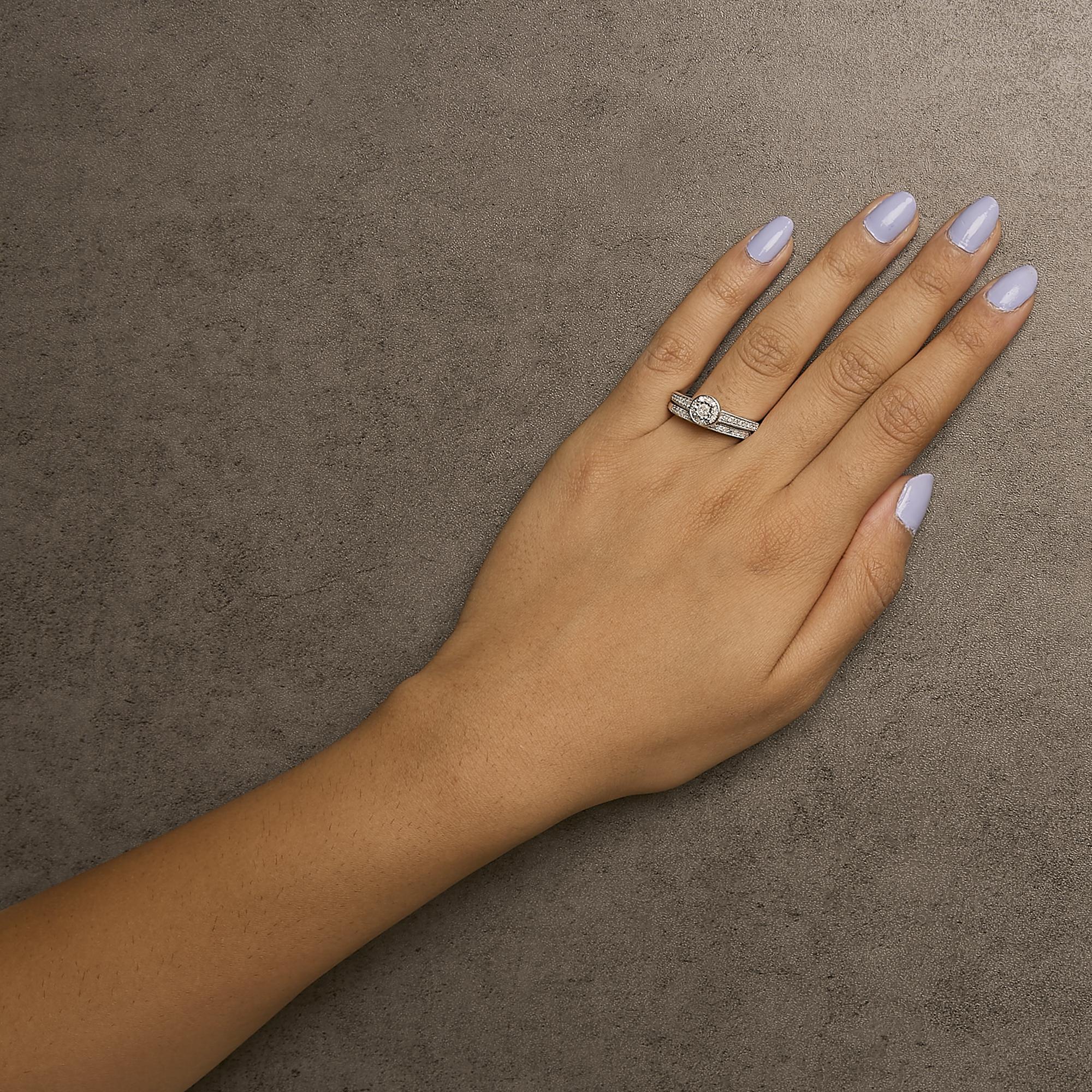 Taglio rotondo .925 A. Silver 1/2 Ctw Anello di fidanzamento con diamanti a raggiera e castoni in vendita