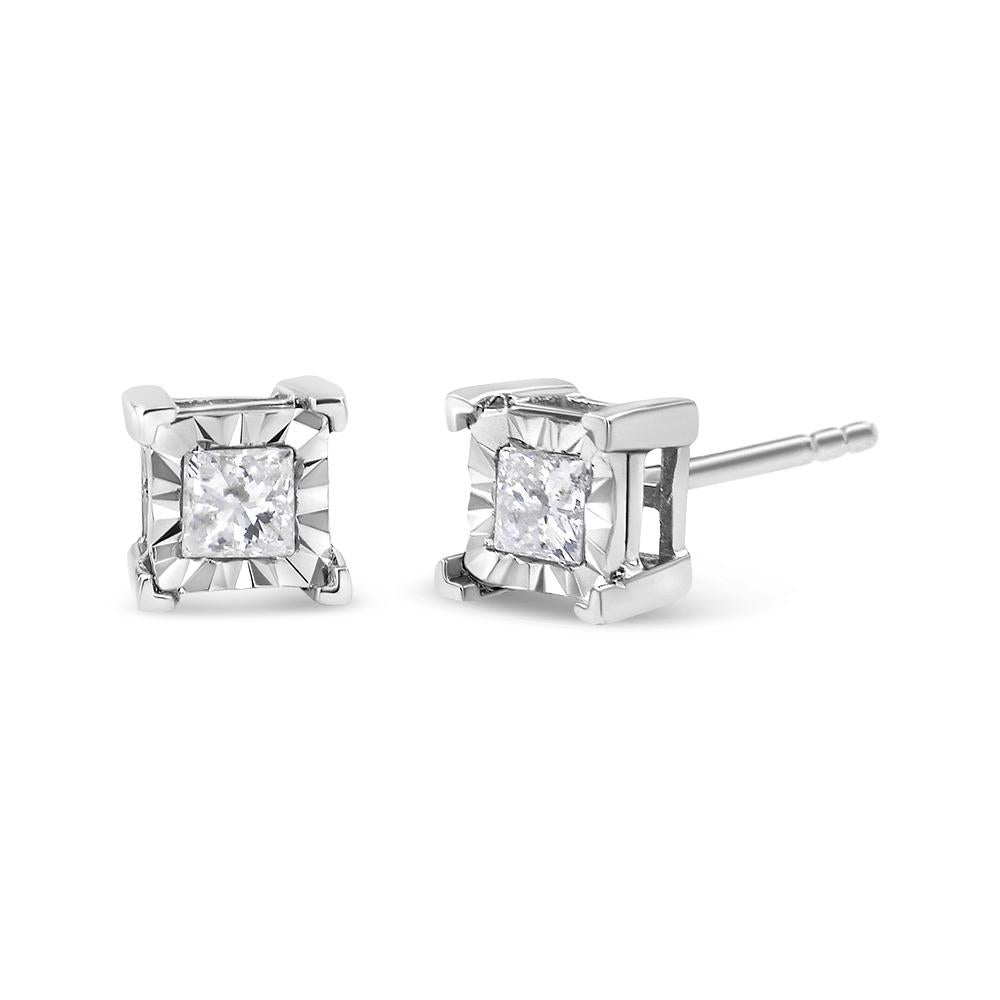 These beautiful diamond stud earrings give an elegant look to any occasion. Each stud features a dazzling princess cut diamond in a miracle setting that allows the diamond to appear larger. 1/3 ct TDW of diamonds are showcased in these .925 sterling