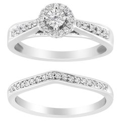 Anello di fidanzamento con diamante aureolato e con gambo in pavé in .925 Sterling Silver da 1/3 cttw