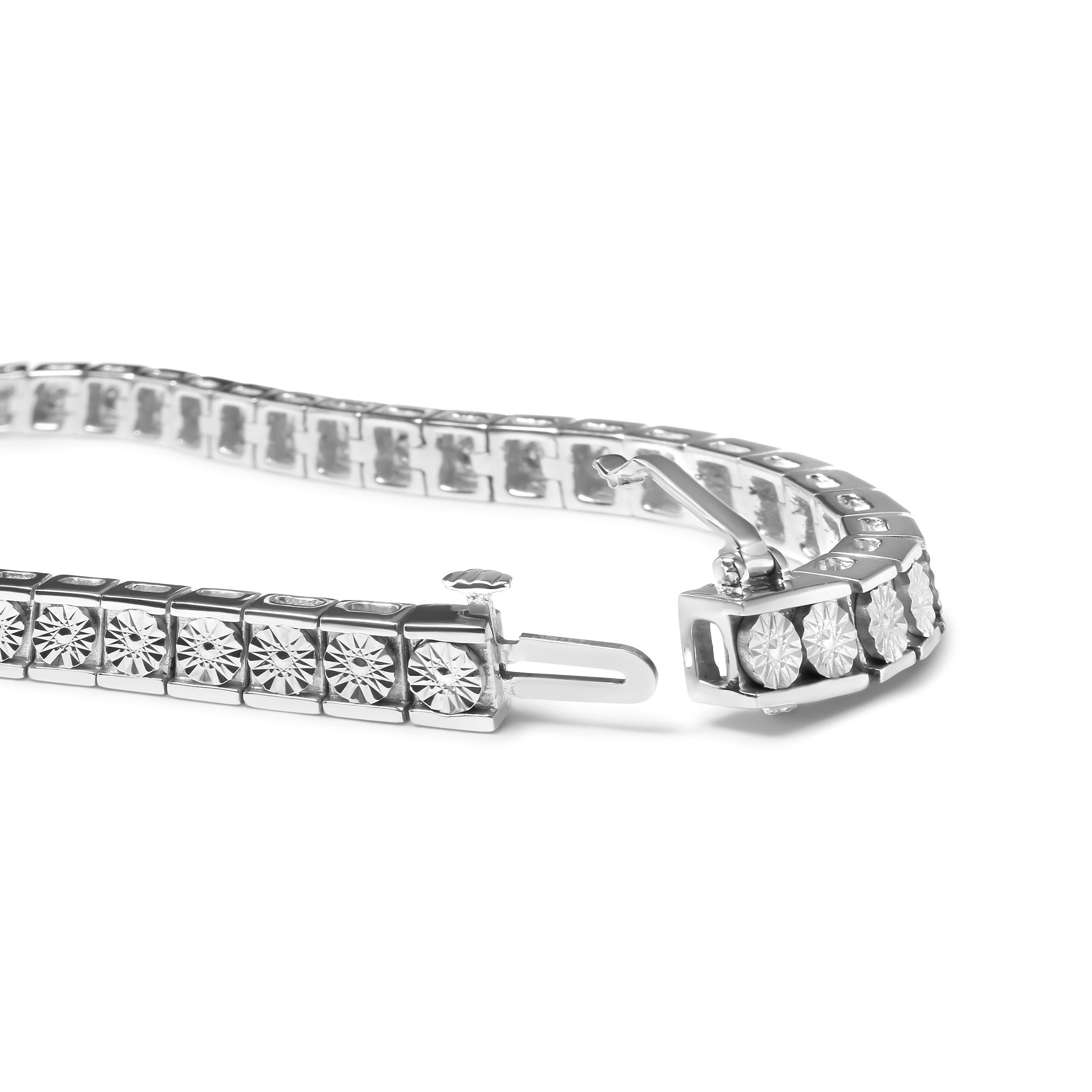 Enhance your jewelry collection with a stunning and elegant addition. This beautiful sterling silver tennis bracelet features a breathtaking display of 24 natural round cut diamonds, weighing in at a total of 1/4 carats. Expertly set in a miracle