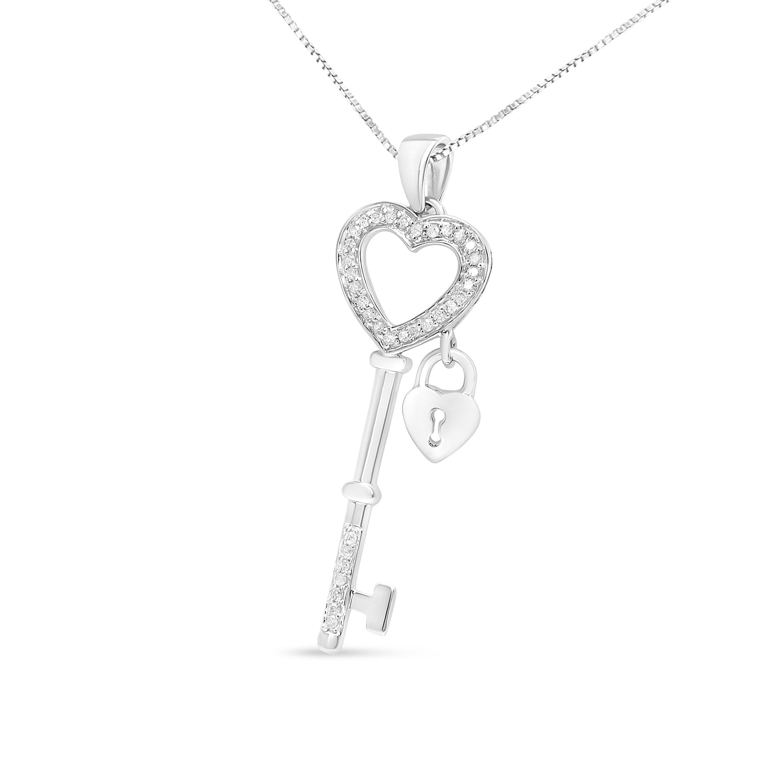 Unlock the key to your heart with this stunning .925 sterling silver pendant necklace. This elegant piece features a captivating diamond-encrusted lock and key design, a symbol of everlasting love and commitment. The pendant sparkles with a total of