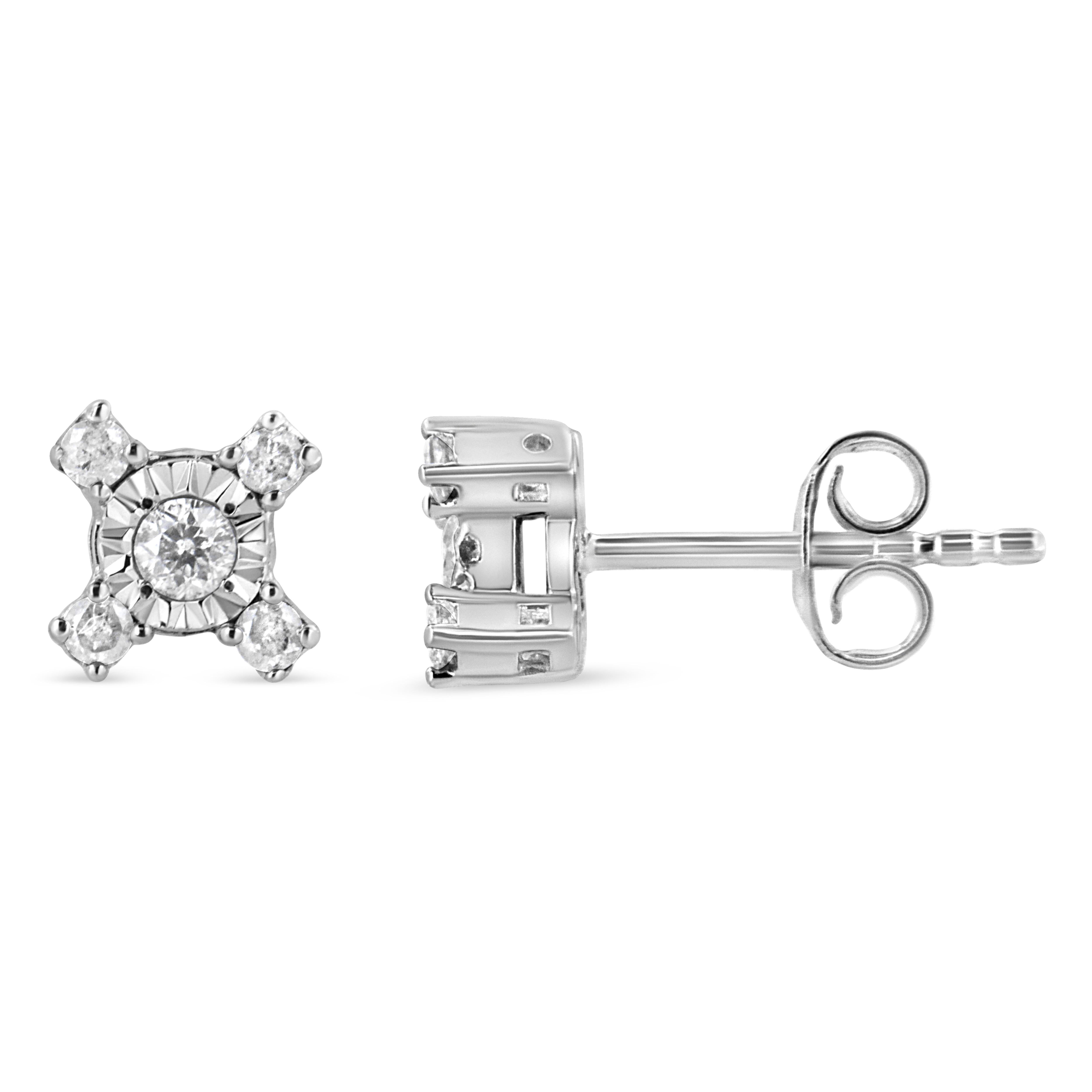 These earrings are unique twist on the classic everyday studs. A sparkling round-cut diamond is set in a miracle setting at the center of this piece, and four princess-cut diamonds frame the central motif creating a stunning 