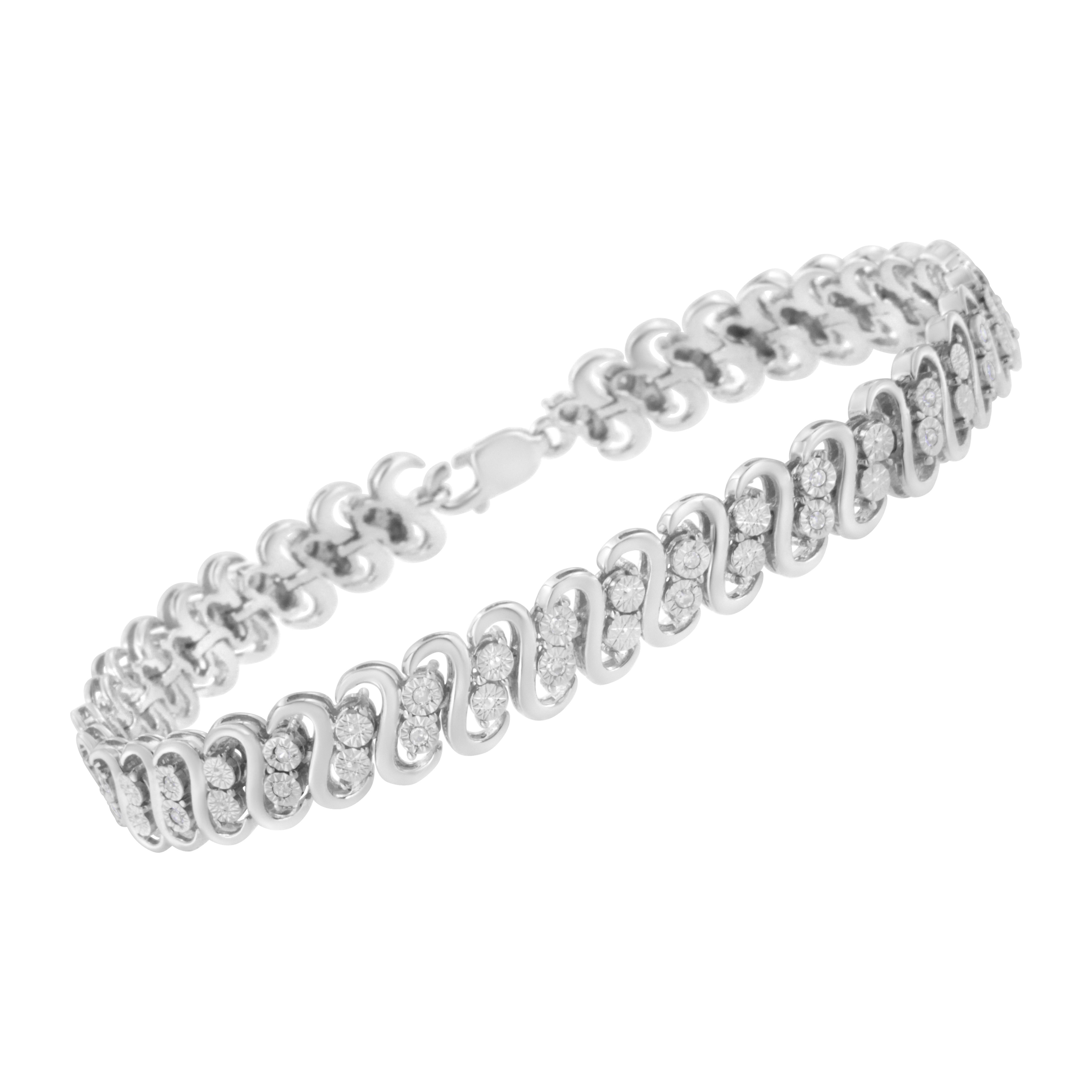 This striking link bracelet glistens with a double row of round cut diamonds set between S shaped links. Made in sterling silver, this design features 1/4ct TDW of diamonds. A box with clasp mechanism secures the bracelet making it the perfect touch