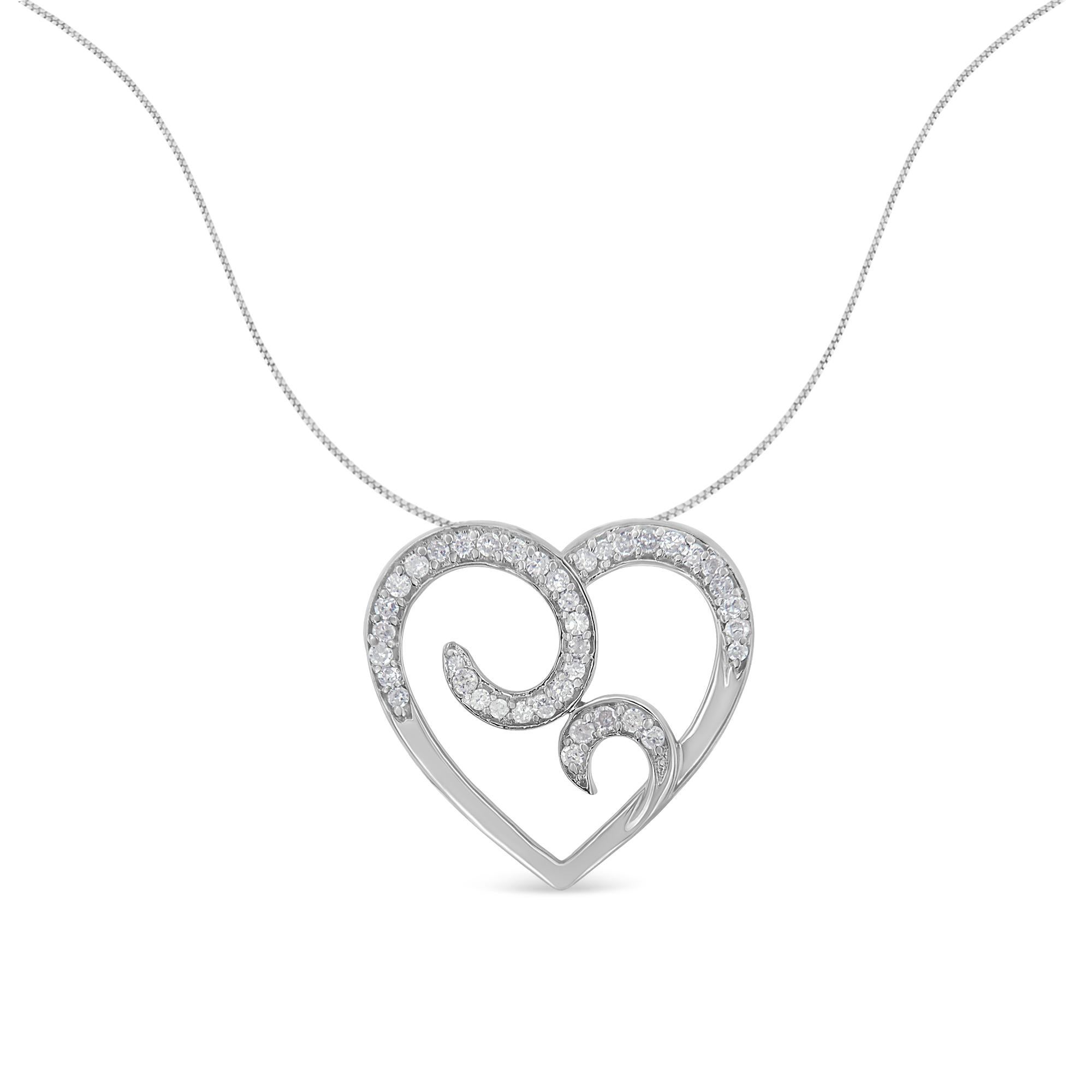 Set her heart ablaze with this shimmering diamond heart pendant necklace. More than 0.25 carat of diamonds are set in bright sterling silver crafted into a soft curving heart shape. Wrap it up with a bow and the pendant makes a perfect gift for