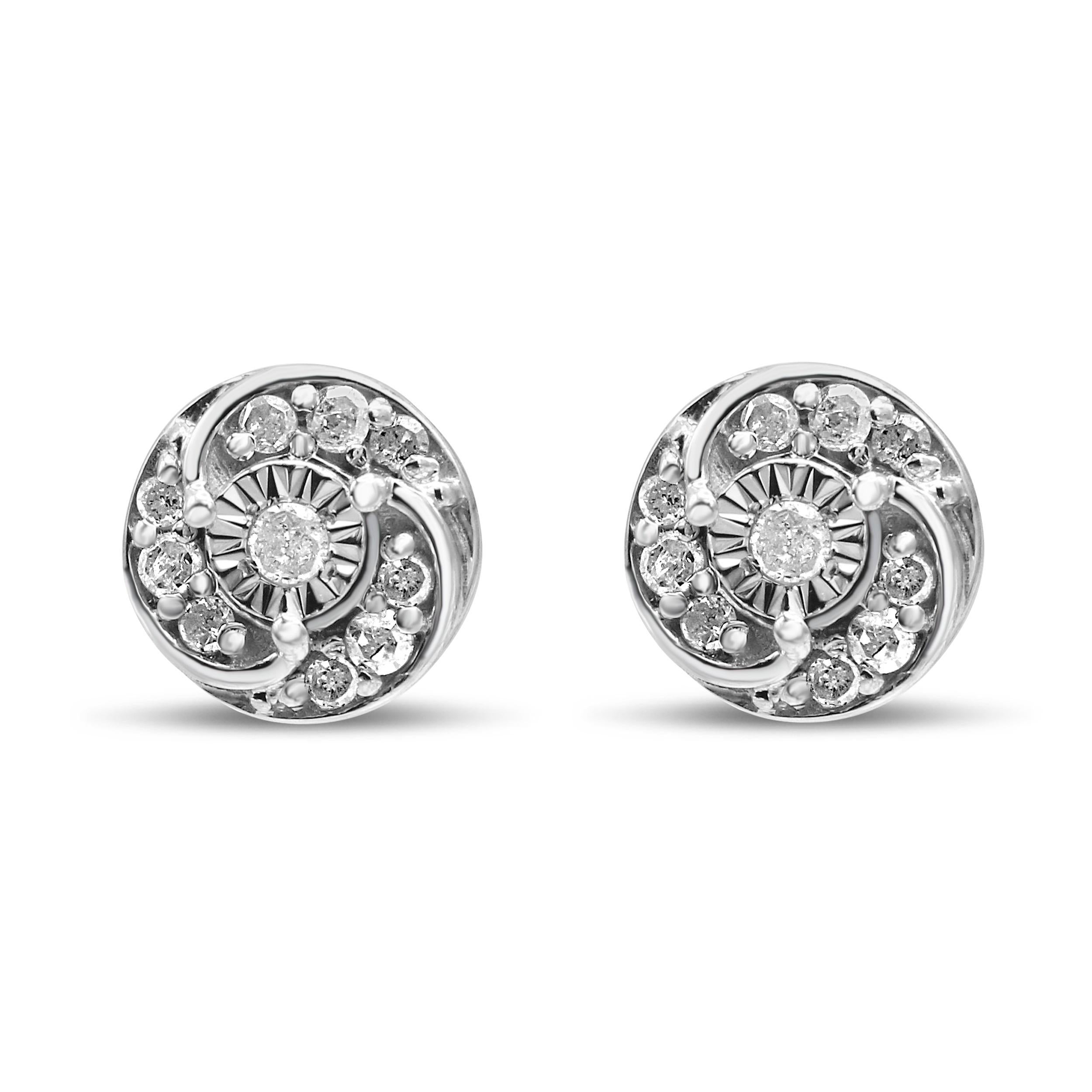 These diamond cluster earrings are mesmerizing in a spiraling design and heightened by luxurious textural elements. The total 1/4 cttw diamonds with an approximate I-J Color and I2-I3 Clarity will put a sparkle in your eye. The layout of the stones