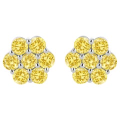 .925 Sterling Silver 1/4 Carat Treated Yellow Diamond Floral Stud Earrings