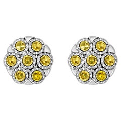 Boucles d'oreilles à fleurs en argent sterling avec diamants de couleur jaune traités de 1/4 carat