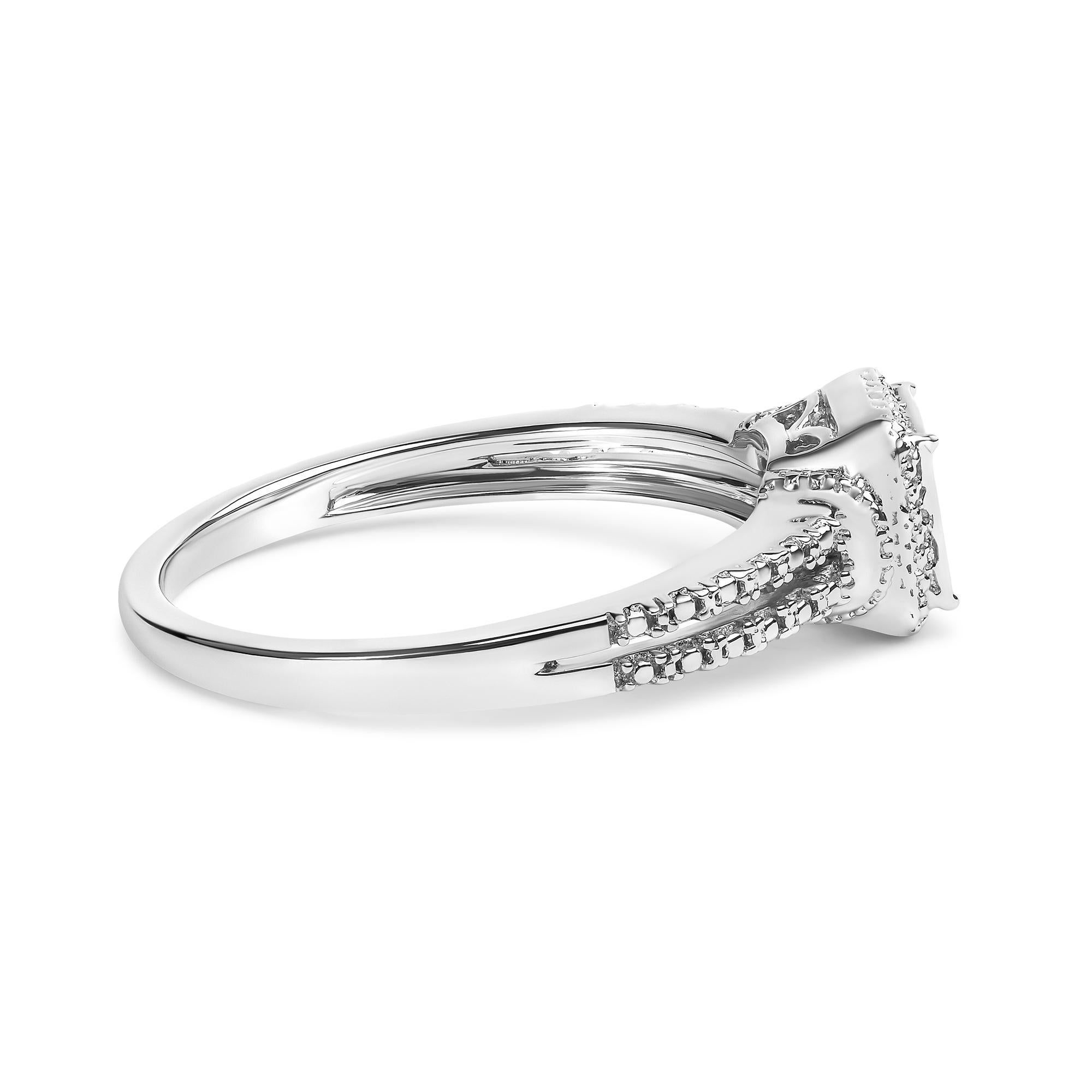 Whether you’re wearing it as a fashion piece or as an engagement ring, this piece will definitely be a conversation starter. Crafted in .925 Sterling Silver, the ring is adorned with 25 princess-cut diamonds in an invisible setting that total up to