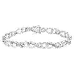 .925 Sterling Silver 1/5 Cttw Diamond 7” Infinity Heart Tennis Bracelet