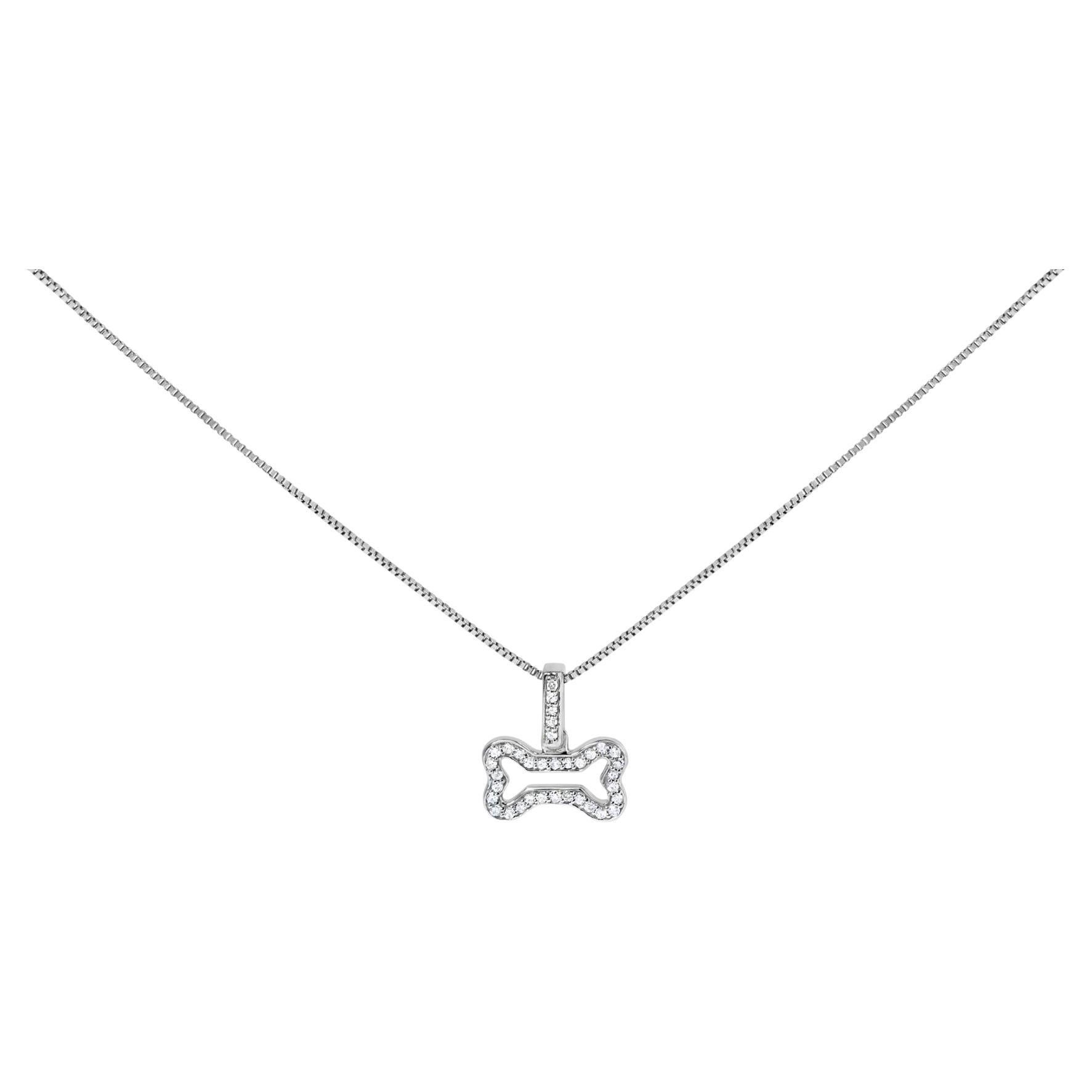 Collana con ciondolo a forma di osso di cane in argento 925 con diamante da 1/5 ct. in vendita