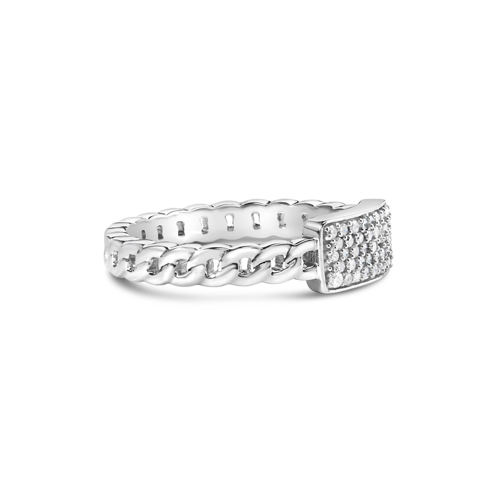 Discover the exquisite blend of classic allure and contemporary flair with our sterling silver diamond ID ring. Crafted from .925 sterling silver, this piece is rhodium-plated for an enchanting, mirror-like sheen that promises enduring beauty. The