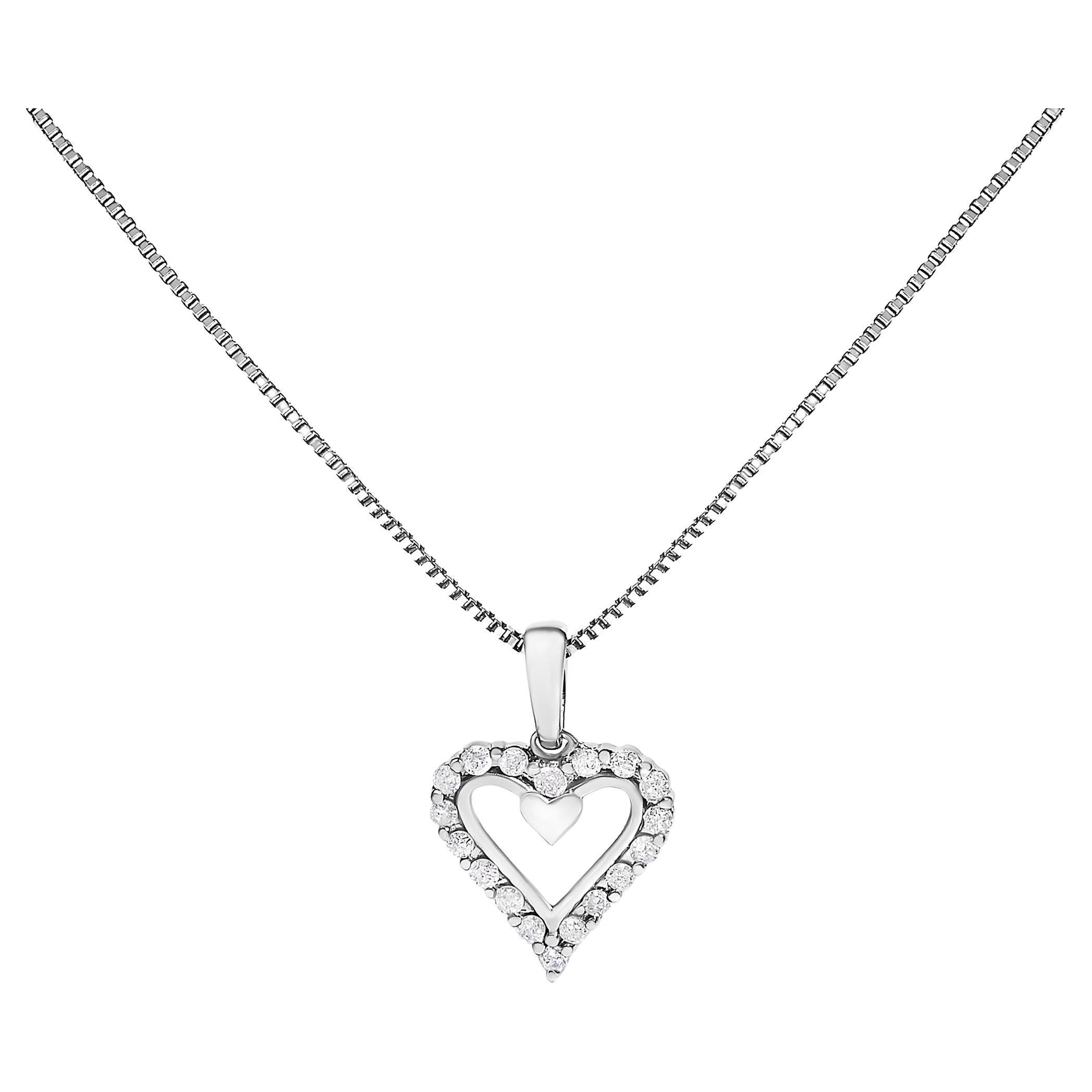 Collana con ciondolo a cuore aperto in argento 925 con diamanti da 1/5 ctw