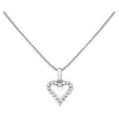 Collana con ciondolo a cuore aperto in argento 925 con diamanti da 1/5 ctw