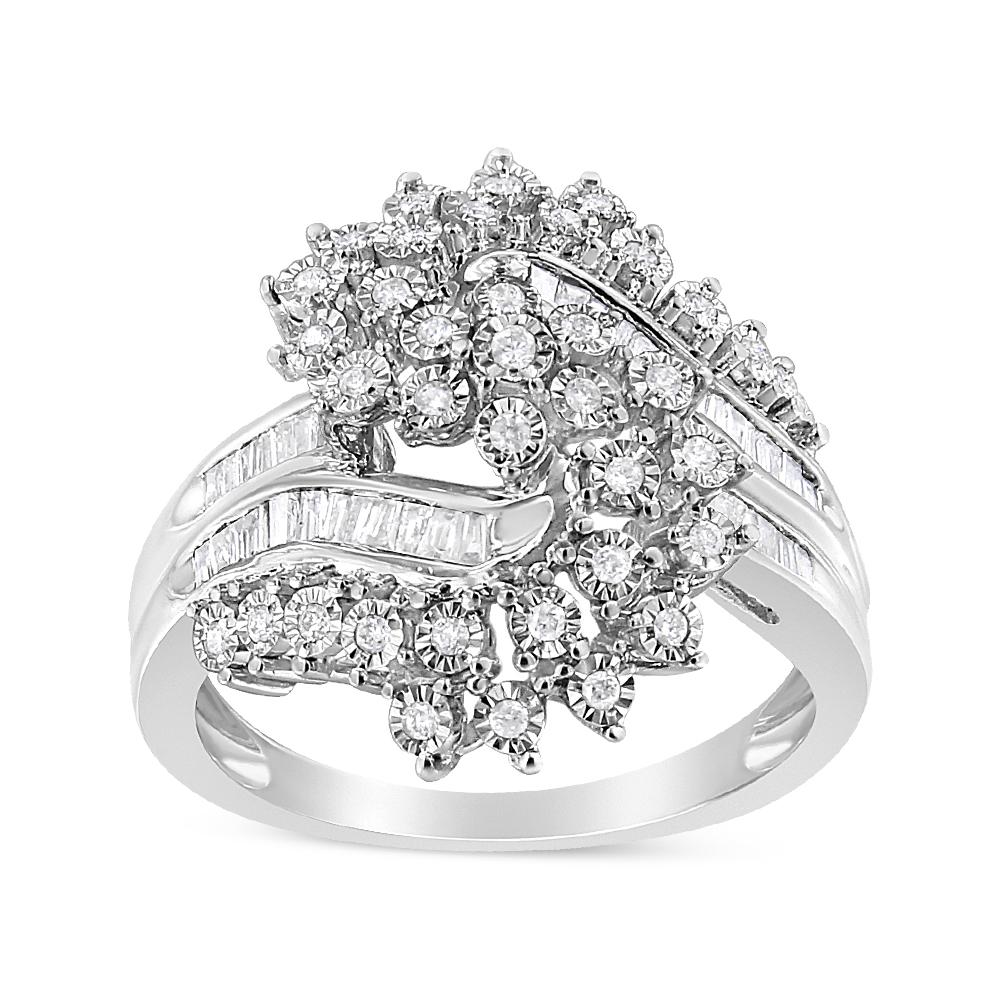 This gorgeous cocktail ring is created with a unique crossover design that boasts beautiful diamonds and stunning .925 sterling silver. Three round-cut diamonds sparkle in an elegant miracle setting, while smaller round-cut diamonds embellish a