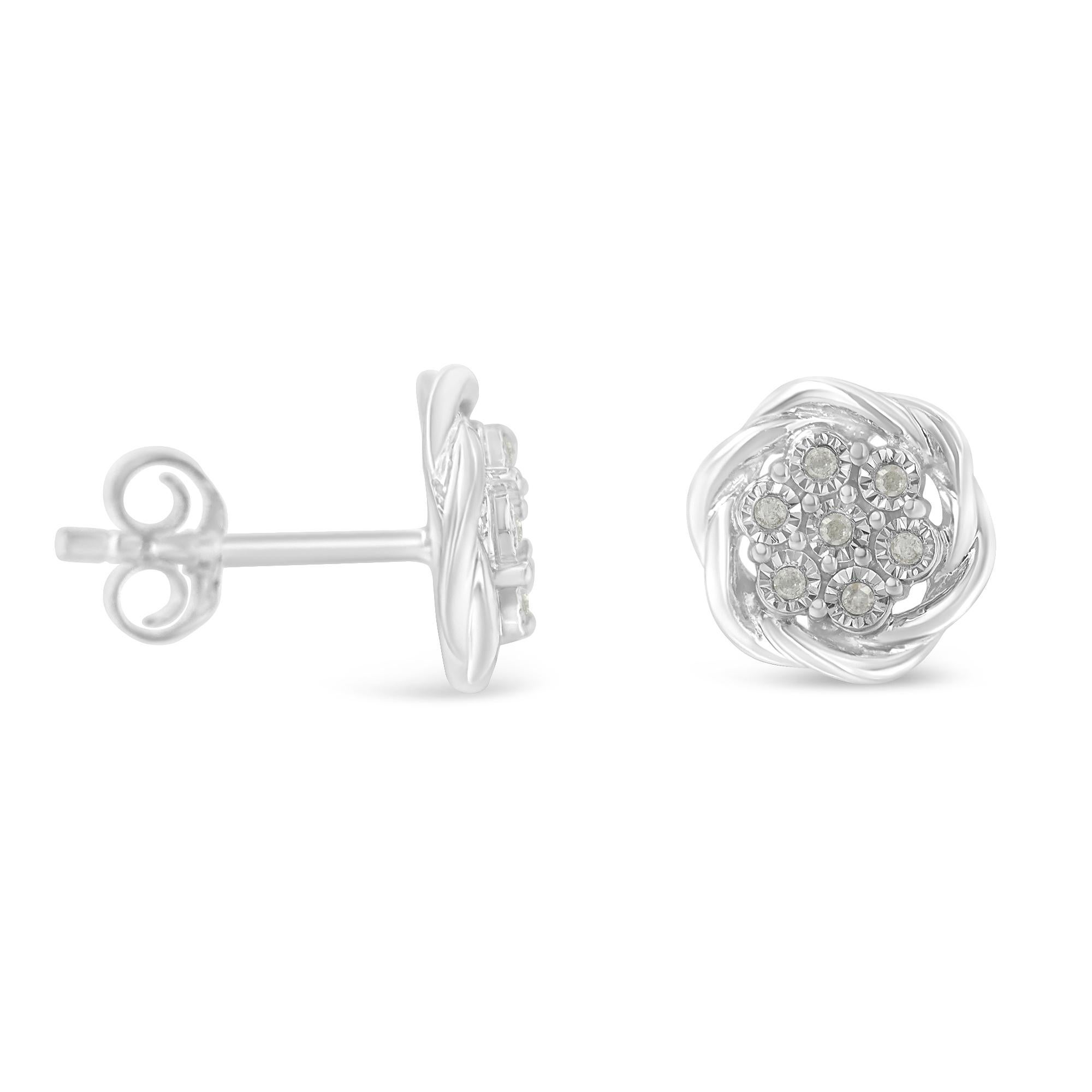Feminine and delicate, add a touch of whimsical and romantic character to your evening wear or business ensemble with our Art Deco-inspired Sterling Silver Diamond Swirl Cluster Stud Earrings. Impeccably crafted, it features 14 pieces of round-cut