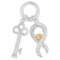 Collier pendentif clé symbole de diamants de 1/6 carats en argent sterling .925