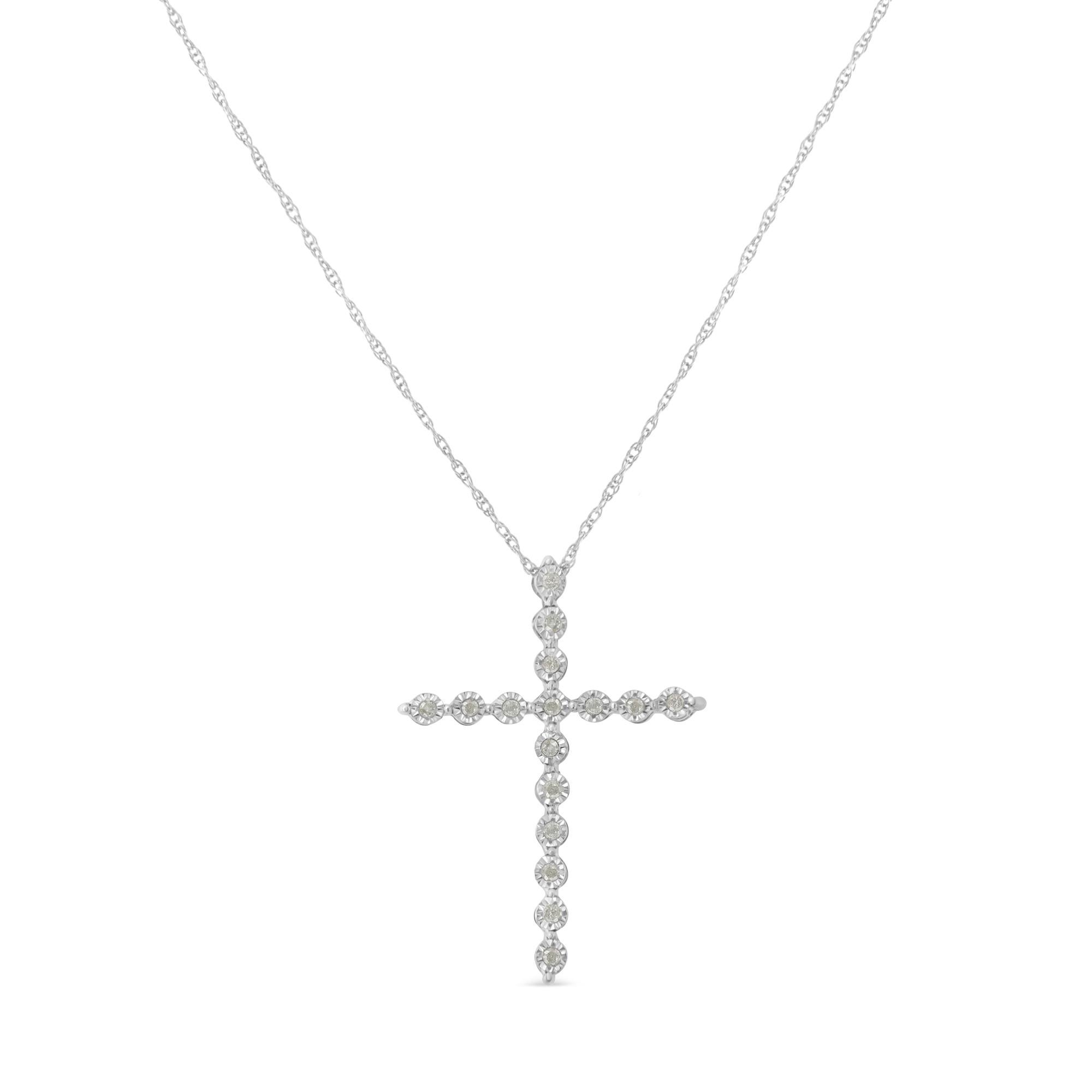 This beautiful piece of jewelry is not only a symbol of devotion and faith but also a true work of art. This gorgeous .925 sterling silver pendant necklace features sixteen round, rose cut, promo quality diamonds in a cross design. Each diamond is
