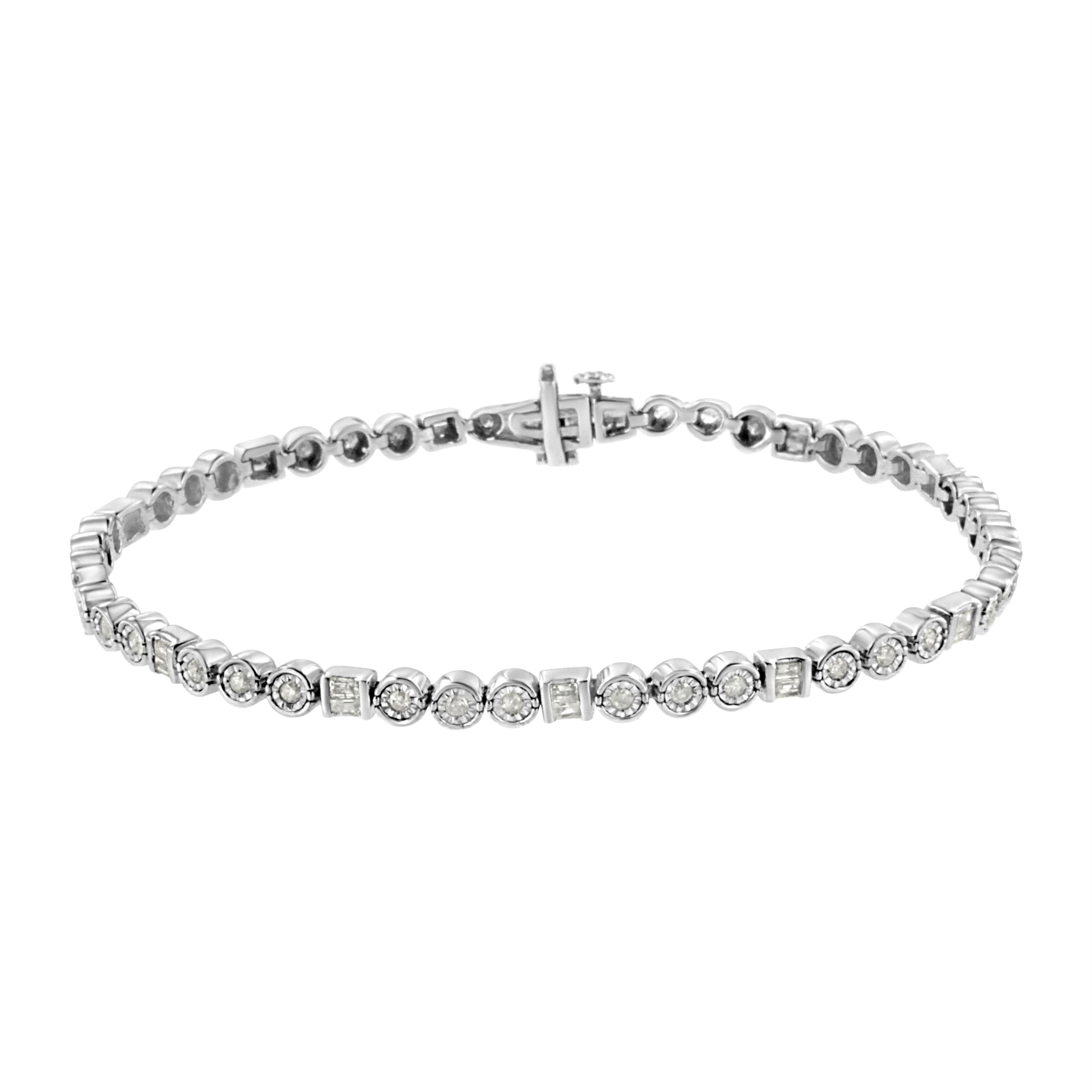 This unique diamond link bracelet has a dazzling alternating design of 3 round sterling silver links embellished with round-cut diamonds alternating with 1 sterling silver channel set with baguette-cut diamonds. This beautiful piece is set with a