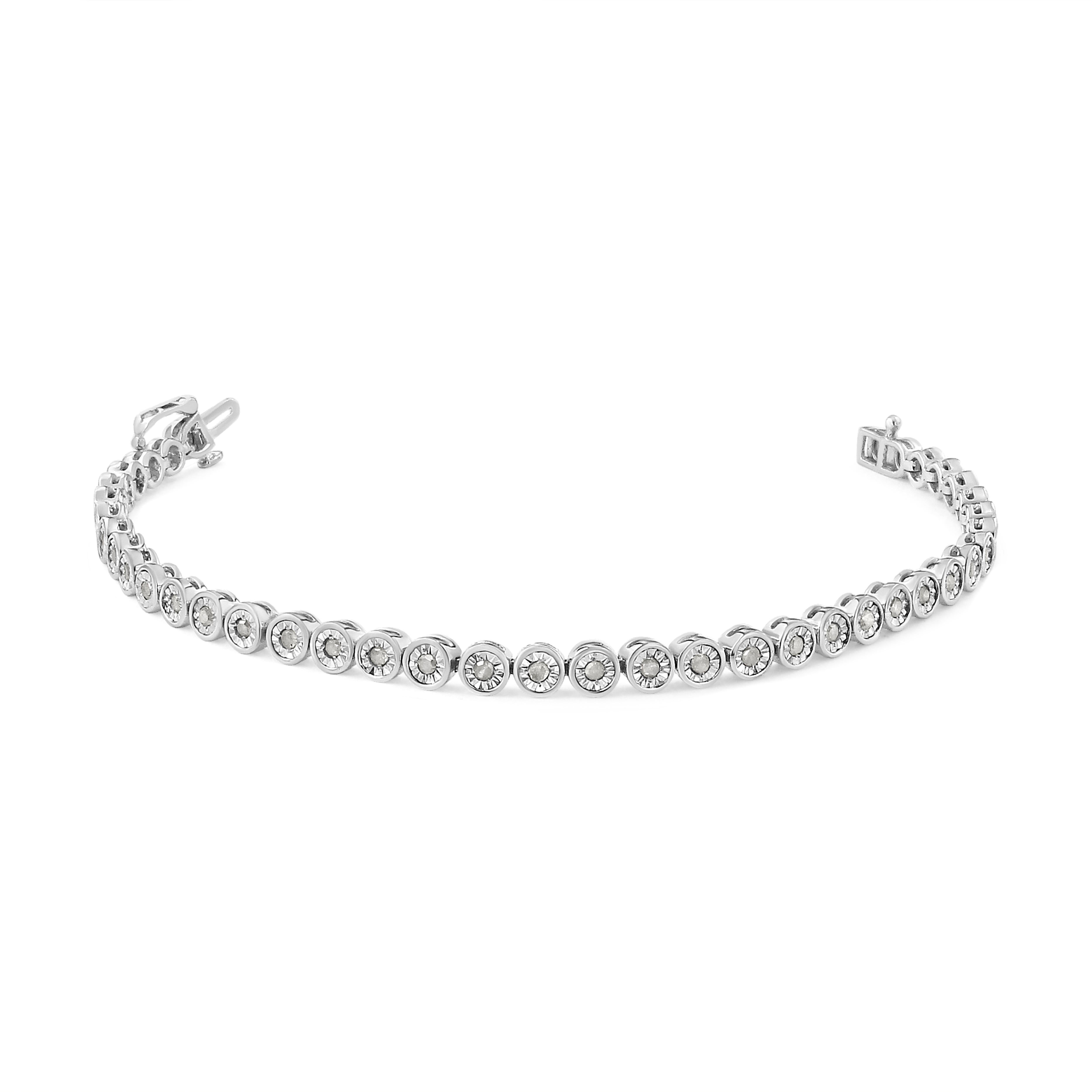 Elegant and timeless, this gorgeous sterling silver tennis bracelet features 1.0 carat total weight of round, miracle set diamonds. The tennis bracelet features S shaped curved links with a single petite genuine round near colorless I-J color